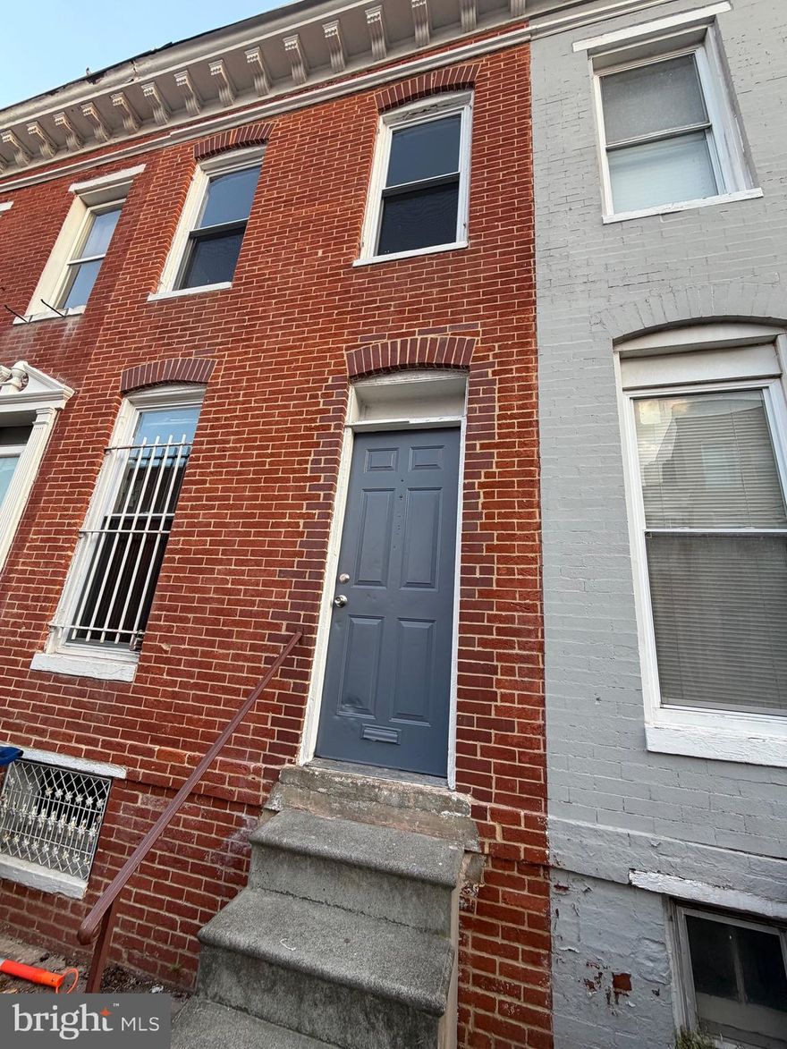Charming Historic Rowhome in Hollins Market – 747 Carroll St, Baltimore, MD 21230
Welcome home to this inviting 2-bedroom, 1-bath brick rowhome offering approximately 1,400+ total square feet. 
This well-maintained gem features a bright and spacious living room with a warm brick fireplace and a functional eat-in kitchen. The practical layout flows nicely for everyday living and entertaining. Best of all, you’ll love the private fenced backyard — perfect for relaxing, BBQs, gardening, or unwinding outdoors.
Nestled in the heart of vibrant Hollins Market, you’re just steps from local shops, parks, and community events, with easy access to downtown Baltimore, Camden Yards, and major highways. Whether you’re a first-time buyer, downsizer, or investor, this home offers historic charm, solid bones, and excellent potential at an affordable price.
A fantastic opportunity in an up-and-coming neighborhood — schedule your showing today and make 747 Carroll Street your new address!