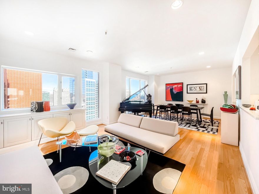 Newly listed three bedroom plus an additional den  / two and a half bath unit at The Towers at Harbor Court on the 26th floor. This incredible unit features an open floor plan, beautiful hardwood flooring, and recently remodeled kitchen with high-end appliances with a large pantry, remodeled baths, spectacular inner harbor and stadium views, custom built-ins, large owner's suite, walk-in closet. Includes 1 deeded parking space and double storage space. Direct indoor access to hotel amenities in the Royal Sonesta, and a single guest suite. Other amenities include 24hr front desk staff, doorman, and party room.