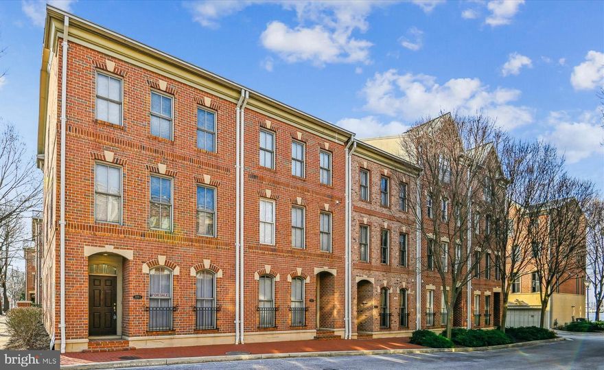 Home has a VA Assumption Loan, Rate is 3%. Incredible Opportunity to Own this 2,400 Sq ft End Unit 3-Story Townhouse w/ 2 Car Garage in the Waterfront Community of The North Shore in Canton. This gorgeous end unit Townhome features 3 Levels of Living Space including 3 Bedrooms, 3.5 Baths and lots of windows for those loving natural light. The home is remarkable quiet inside but close to all the action. You will get to enjoy water views from the front and rear of this beautiful townhome located right off the Promenade, and within walking distance to countless Restaurants/Bar, Shopping, Parks & Entertainment. The 1st Fl of this home features a 2-Car Garage w/ 2 Parking Pads, plus Brick Privacy Wall to Boston Street, a Bedroom/Office and Full Bath w/ Tub/Shower Combo. As you make your way up to the Open Concept 2nd Level Features Hardwood Floors, Large Family/Living Room Dining & Kitchen, Half Bath and a deck w/ Water Views, it's just perfect for Entertaining. Kitchen boasts Granite Counter Tops, 42" Cabinets for plenty of storage. The 3rd Level Primary Bedroom w/ En-Suite that includes Walk-in Closet, Tray Ceiling, Soaking Tub, Shower Stall, Double Vanities and a Private Balcony w/ Water View. The 2nd Bedroom also on the 3rd Level has it's on En-suite w/ Tub/Shower Combo. This one is a must see it's city living at it's best right off the Promenade close to Fell's Point, Little Italy and the Inner Harbor.