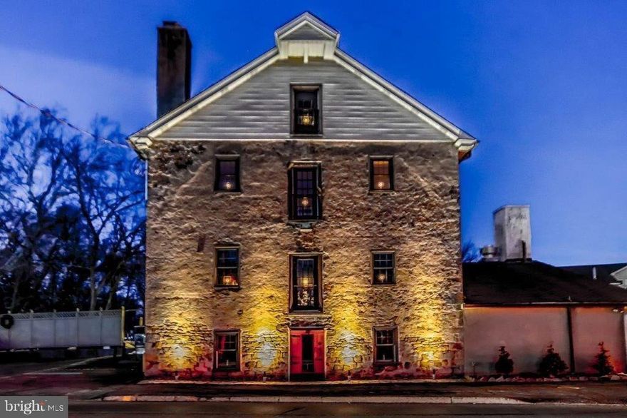 Own a piece of history! Property currently being used as event space with a total of 200  indoor and 100 outdoor seats.  There are three floors along with two outside patio areas.  The first floor is ADA accessible with a stone fireplace, exposed walls, and historic wood beams,  full size prep kitchen and restroom.  The second floor has commercial open kitchen, high ceilings, wood floors, stone fireplace and windows for natural lighting and a restroom.  The third floor space (once an apartment) also has hardwood floors, large wood beams, brick fireplace,  and restroom. There is addt'l office space on the third floor.   The attic space is large, currently being used as storage and offers  high ceilings as well.  The outdoor patio areas are situated along the picturesque Pennypack creek with the lower patio being ADA accessible. The entire building was restored in 2016. Each floor has separate HVAC units. There are endless possibilities for retail or food service space (see attached use regulations list in documents) **  Don't miss the aerial video attached.