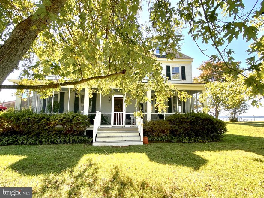 Step back in time. This beautiful, historic home oozes charm and character. From the inviting full screened porch to the beautiful and amazing views of Lancaster Creek, with views of the Rappahannock, you will be captivated the moment you walk in! An inviting foyer with a grand staircase welcomes you. On the first floor you will find a spacious family room that also serves as a dining area, warmed by a wood burning fireplace and magnificent views from large, dramatic windows. The eat-in kitchen is a dream for entertaining or relaxing and features a breakfast bar, 2 ovens and lots of room for guests! There is a first-floor bedroom and a full bath. On the second floor, you will find a spacious and dramatic primary bedroom, complete, with dressing room and walk-in closet. The hall bath is off the primary, giving access to two additional, spacious bedrooms with amazing waterfront views. The finished 3rd floor offers lots of space for recreation, sleeping (with 3 twin bed alcoves!) and great storage. Beautiful hardwood under carpet! If you're searching for the perfect family gathering spot or full-time home on the river, look no more! Morattico is a conveniently located quaint village.