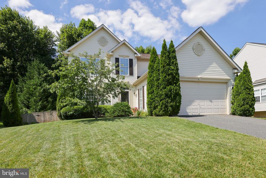 Nestled in the sought-after Gunpowder Ridge subdivision, 110 Spry Island offers life in a wonderful community. With bright, light-filled spaces, the rooms are generously sized with 9-foot ceilings on the main living levels. The home has 4 bedrooms, 2 1/2 baths, attached 2-car garage and partially finished basement. The spacious kitchen features a large double tiered island with plenty of counter space and storage in the 42" maple cabinetry, as well as matching stainless appliances. The kitchen spills into a lovely morning room addition with a wall of windows and vaulted ceiling, and into the comfortable family room with gas fireplace. A formal living room with bay window, dining room and powder room complete the first floor. Four bedrooms and two full baths comprise the second floor. The primary suite is a serene retreat that is amply sized with vaulted ceilings in the bedroom and bath, and the ensuite bath has a deep, jetted tub. The area is finished with a roomy walk-in closet. The lower level basement features a large finished section for fun and relaxation, and an unfinished space with abundant storage. Entire home has been freshly painted. The architectural shingled roof and siding are almost new. A large deck spans the width of the home. This beauty is sited on a great lot with a private back yard that backs to trees.