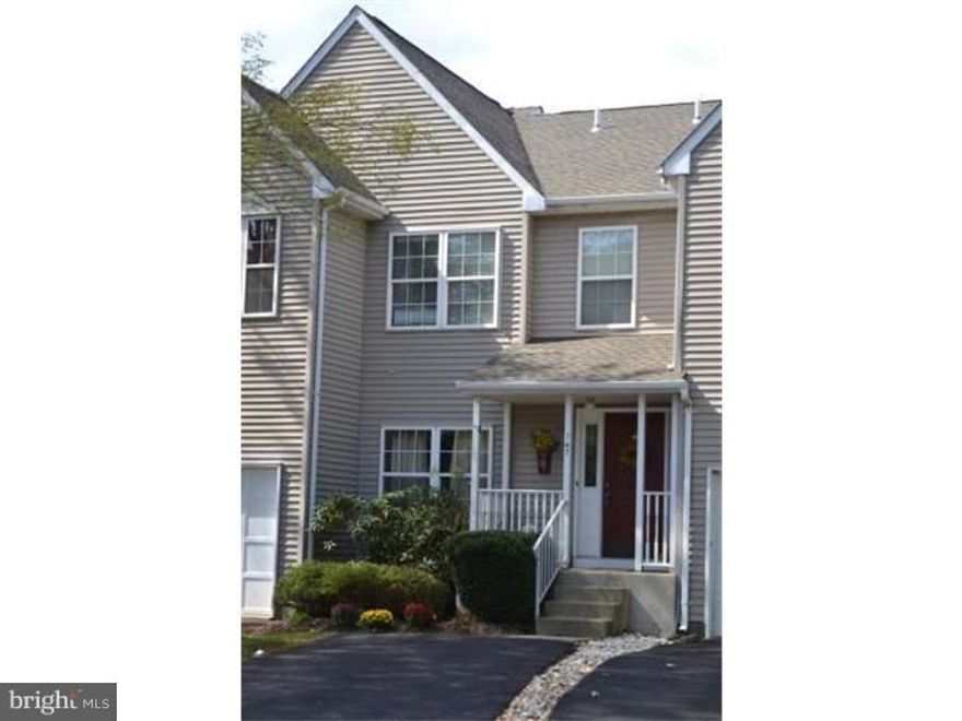 Completely updated 3 bedroom, 2 1/2 bath Townhouse with almost 2,000 sq. feet of living space with the finished Walk-Out Basement which offers built in shelving and wet bar. Available July 1. Spacious and bright unit with tons of storage. Kitchen updated with brand new stainless steel appliances and granite counter tops. Laundry closet with brand new washer & dryer. Nice sized freshly stained deck off the kitchen. Master bath has been updated with new vanity and double sinks, granite counter tops, new tile flooring, with tub and separate shower. Additional full bath upstairs updated with granite counter top, new vanity, and tile flooring. Powder room has been updated with new tile flooring and a pedestal sink. The entire townhouse has been professionally painted along with brand new neutral carpet throughout and all new lighting fixtures. There is one parking spot and additional parking in lot. This townhouse is located on a cul-de-sac and Charing Cross is minutes away from shopping, highways, Doylestown Boro and Award Winning Central Bucks Schools. Condo fee is included in rent which covers trash & recycling, common area maintenance and exterior building maintenance.  Don't let this one get away!