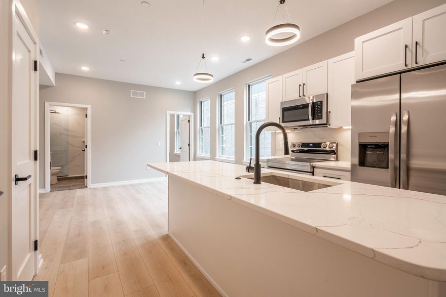 1 Month Rent free for Leases starting by December 1 and Expiring Spring/Summer of 2026

Beautiful, brand new construction units in the heart of Bella Vista. Upon entering you will find a beautiful kitchen with shaker style cabinetry, stainless appliances, and quartz countertops. The unit features a large open living room, huge windows, laundry, one bedroom and a full bath all on convenient one floor living. Unique, brand new unit within walking distance to Whole Foods, Acme, the Italian Market, and a ton of great bars, restaurants and coffee shops. Don't miss this opportunity, these units will rent quickly! Available immediately.