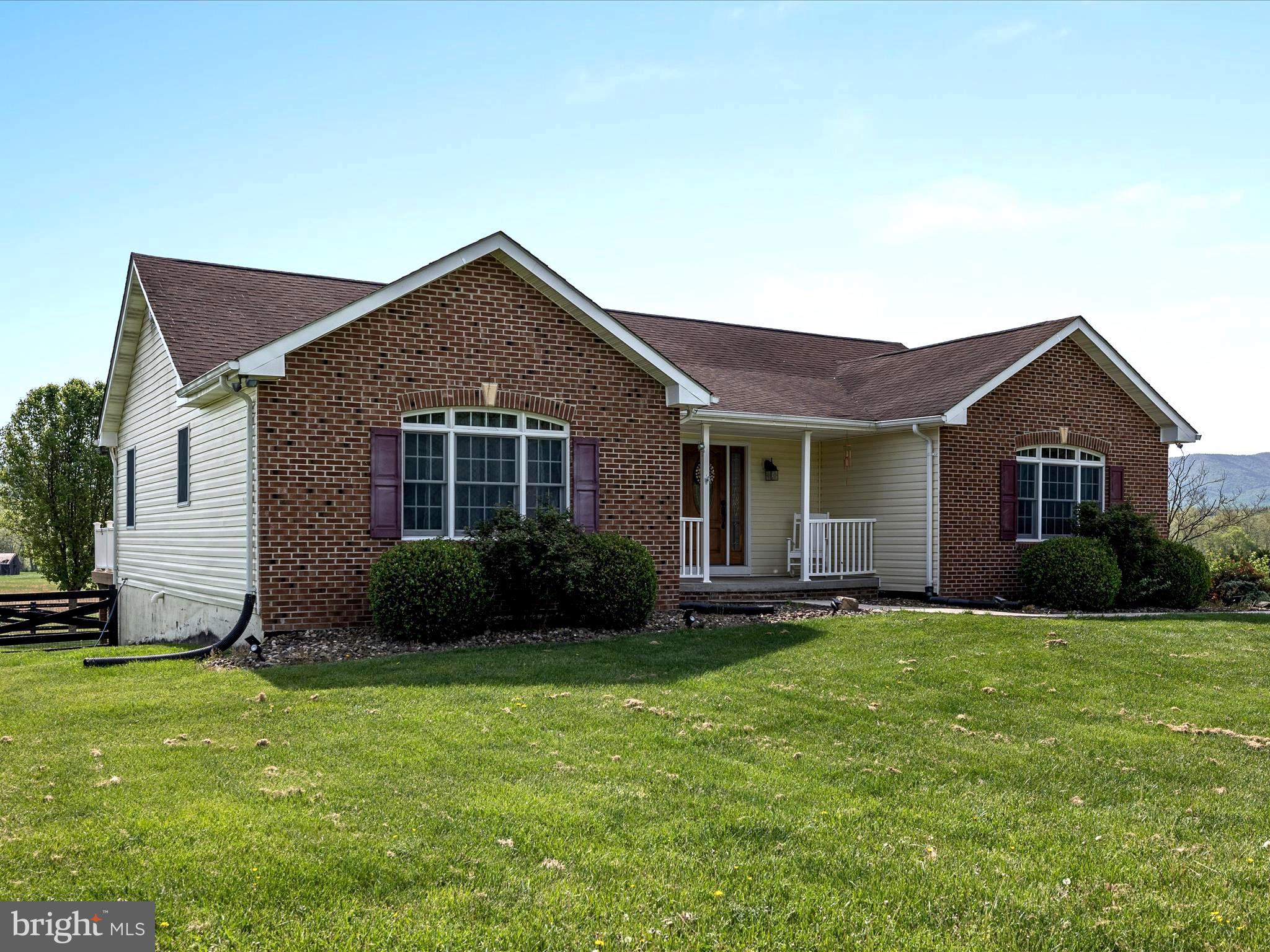 $10,000 Price Reduction!
Come tour this stunning 3BD/2BA ranch-style home with over 4,000 sq ft of finished living space on 4 level acres with breathtaking mountain views!
This beautifully maintained home offers an open and inviting layout with warm hardwood floors, a formal dining room, and a spacious kitchen featuring built-in stainless steel appliances. The main level includes two generously sized bedrooms, including a primary suite with a luxurious jacuzzi tub, walk-in shower, and ample closet space.
The fully finished basement provides additional living flexibility with a third bedroom, a bonus den or guest room, and a dedicated office or home gym space—plus incredible storage throughout.
Step outside to a large back porch, perfect for relaxing or entertaining. Enjoy the hot tub with mountain views, a workshop, run-in shed, storage shed, and a fenced play area—all adding to the home’s charm and functionality.
Located just 5 minutes from downtown Wardensville’s shops, restaurants, and Cacapon River access. Only 30 minutes to Winchester and under 2 hours to Washington, DC! Be sure to check out the 3D tour - call today for more information!
