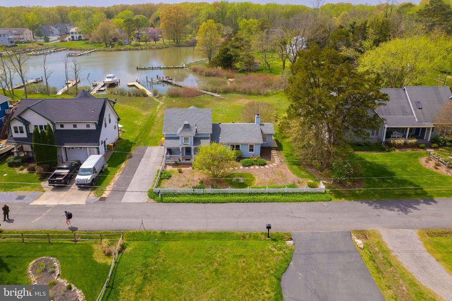 Step inside and envision the potential of this waterfront retreat—ready to be transformed into your dream home. Priced to accommodate necessary repairs following water intrusion from tidal and rainwater, particularly affecting the lower portion of the house. Recently installed pier boards, enjoy effortless access to the bay and embrace waterfront living at its finest. Please note, due to the property's condition, cash offers are preferred. Don't miss this opportunity to create your own slice of waterfront paradise. Schedule a visit today and let your imagination run wild!