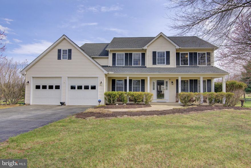 Traditional 4 Bedroom Colonial nestled on 5 acres of rolling hills situated amid wine country, conveniently located between the town of Purcellville and Hillsboro. The quaint community of 7 homes creates a communal aspect where neighbors lend a helping hand with mowing, re-grading potholes, or any other maintenance the community needs (no HOA). Driving up the long-paved driveway, this colonial home is strategically placed to fully utilize the afternoon sun and enjoy the evening shade while taking in the breathtaking views.

This nearly 3,000 sq.ft. home boasts a two-story foyer, wide plank hardwood floors, formal dining and front office (includes high speed FiOS), perfectly placed to either enjoy the family relaxing on the covered front porch or playing in the large front yard. A dual sided stone fireplace captures the attention and perfectly transitions the family room into the large eat-in kitchen. The chief of the home will absolutely love the large amount of cabinets and space to work with while entertaining guests circling around the large center island.

Entertaining guests will be an absolute breeze as they rest and relax in the screened-in covered deck (includes maintenance free Select Trex composite decking, cathedral ceilings with exposed beams, multiple fans and expansive views of the surrounding tranquility. Dual barn doors lead you onto the sundeck to continue the entertainment either enjoying the sun, barbecuing or sitting around a campfire. The kids and guests will love the tranquil and peaceful acres upon acres of back yard perfectly placed and ideal for ATVing or large enough for the horses (can also double as income producing to generate hey for sale).

Continuing inside, the open two-story foyer leads you to freshly painted upper level including four large bedrooms, each with light filling into the home from multiple sides. Full bath conveniently located adjacent to three bedrooms makes for perfect accessibility while the master bedroom is tucked away at the end of the hall and has its own master bath with separate soaking Jacuzzi tub and standing shower. 

Dual doors open to an expansive walk-in closet with tons of space and can be further expanded to include the full space above the two-car garage. Venturing down into the basement, one can choose to keep the space unfinished and use as a storage, utilize for the kids to play or finish off with the full bath rough in to expand the home's living space to a potential 4,125 sq. ft.