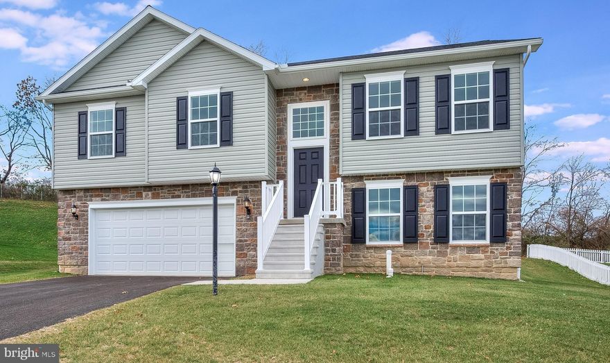 There's room to grow in this beautiful new split foyer with stone accents and oversized garage.  This home features a country kitchen with breakfast bar, granite tops and recessed lighting, three bedrooms, two baths and spacious living area and a 12' x 12' deck for outside enjoyment.  Closing cost assistance available.