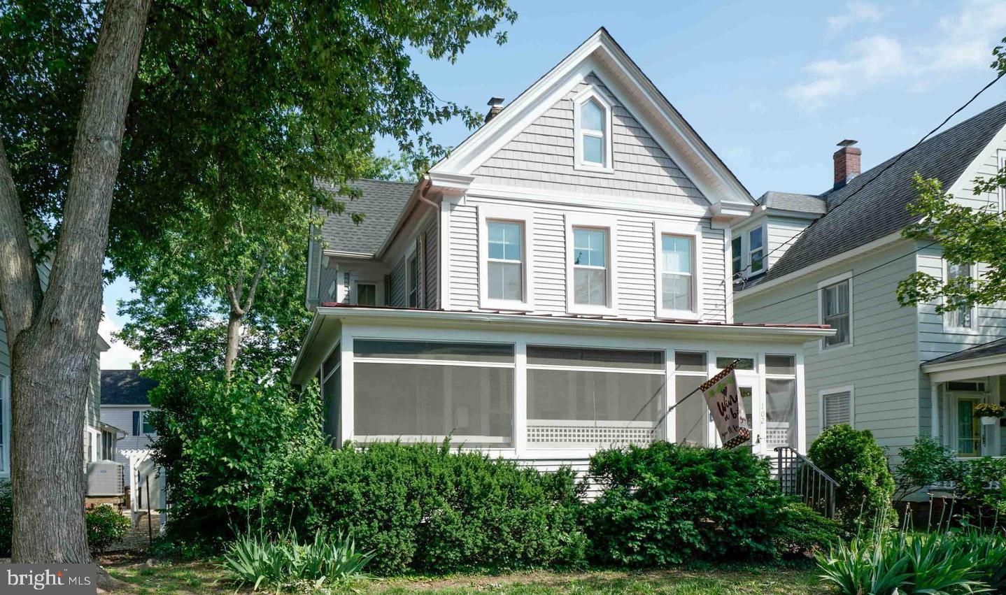 Introducing 102 Choptank Avenue, located in the Historic District-West End. A charming 1918 house that has been completely updated and currently showcases the best of the past and the present. Just steps from the beautiful Choptank River, this house has multiple decks and a charming wrap-around porch affording gorgeous views of the Choptank! The house went through a huge renovation from 2020-2022 that includes new roof, siding, windows, kitchen remodel along with appliances, mahogany front doors, custom window treatments, gas fireplace, rear deck, and HVAC systems. There is also a partial basement making this home 4 levels. The third floor has custom steps and has been insulated and works as a storage area or office. Close proximity to the yacht club and vibrant downtown Cambridge.