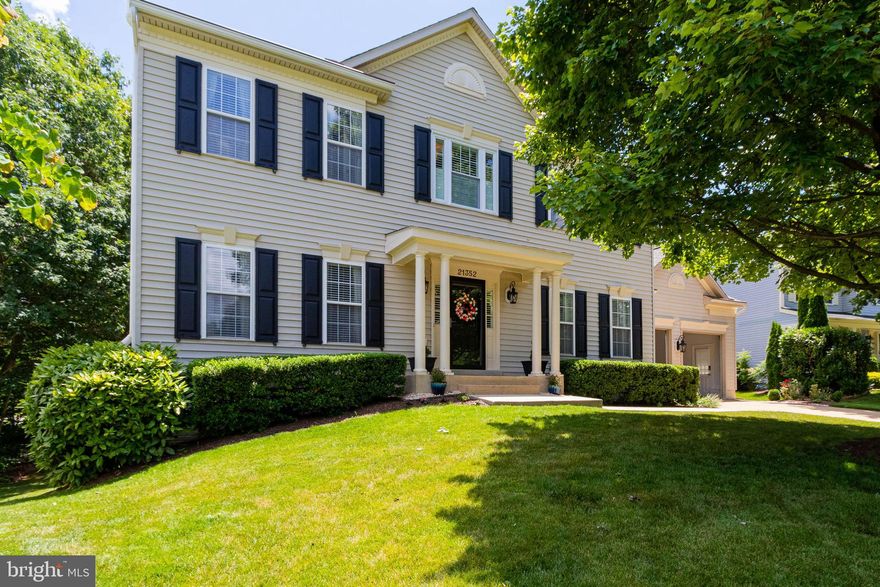 This is the home you have been waiting for in the highly desirable Ashburn Village neighborhood.  Convenient to major commuting corridors including less than 2 miles from the new Silver Line Metro Station, Dulles Airport as well as shops and restaurants.  You won't have to do a thing except move in to this immaculate 4 bedroom 3 full bath home.  Beautiful kitchen with newer upgraded stainless steel appliances, gas cooking, cabinets galore and granite countertops invite the gourmet chef.  Enjoy the sunny breakfast nook or formal dining room with wainscoting for easy entertainment.  Walk out from the family room to deck (built in 2016)  overlooking yard backed by trees for privacy.  Need a main level bedroom with full bath for guests or in-laws then look no further, this home offers perfect separation.  The large upper level master bedroom features vaulted ceiling, hardwood floors, a cozy sitting room, large walk-in closet, dual sinks in master bath , separate tub and shower and new Velux solar powered remote controlled opening sky light with blinds.  Two more generous bedrooms, bathroom and large upper laundry room with 2 built-in drying racks complete the upper level.  A sun drenched lower level walk-out waits for your personal touch to complete to your specific needs.  The oversized two car garage boasts lots of extra space for bikes, tool bench, etc.  Roof was replaced  in 2017 and a Carrier whole house electronic air purifier was installed in 2016. HomeSeer HS3PRO allows you to remotely control interior and exterior lighting, thermostat, garage doors and lock doors.  Thee low HOA offers an array of amenities including the sports pavilion with full gym, 4 outdoor and 1 indoor pol, basketball, tennis and racketball courts and so much more.  MOVE IN, RELAX.  YOU ARE HOME.