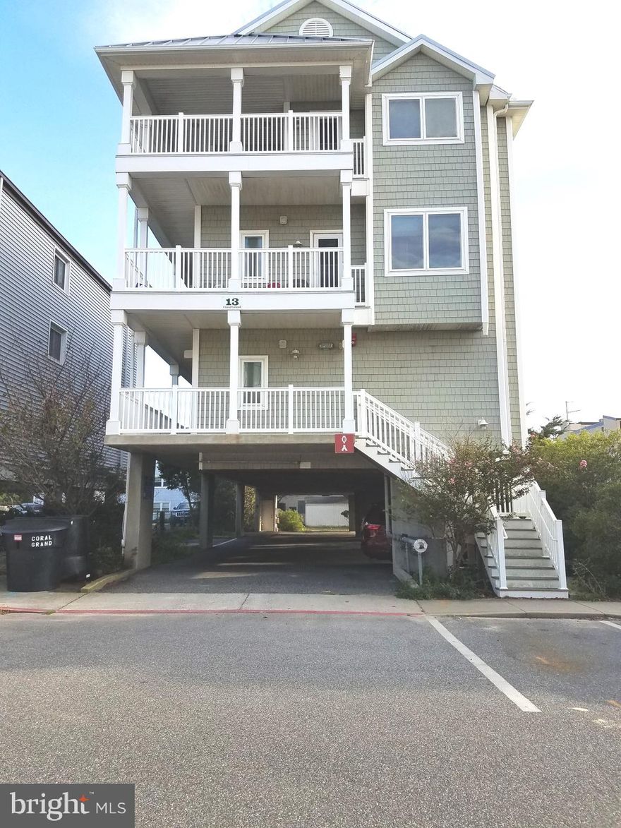 Don't miss out on this better than new 3 Bedroom 3 full bath  Ocean Side  townhome within steps of the beach and north  Ocean City restaurants and attractions.  This gorgeous home boasts designer furnishings* 2 gas fireplaces*  2 Private balconies*  Recent hot tub*  Primary bedroom suite with custom tile shower and seating area and corner fireplace*  Lots of room  for entertaining family and friends  in coastal living room with gas fireplace*  Gourmet kitchen with custom  cabinetry and stainless steel appliances*  Exceptional furnishings* Gleaming hardwood floors* Neutral  decor throughout*   Ground level storage + 2   assigned covered parking spaces!  Come and fall in love with this truly special home