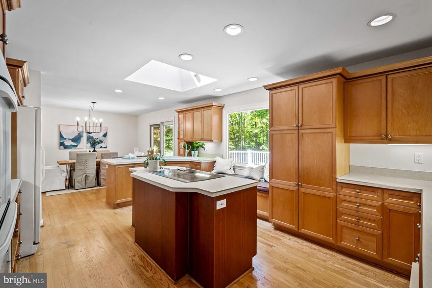 *Please submit offers by Monday 7/17 at 11AM* Lakefront, with 4 bedrooms upstairs, and over 3 acres - wow! With replacement ROOF and WINDOWS (enhancing the natural light throughout), this impeccably maintained home sits on a private, wooded retreat, directly bordering a charming lake. Featuring a larger kitchen than most homes with custom, high-end cabinetry, and a walk-in pantry, it's perfect for culinary enthusiasts. Being less than 5 minutes to Rt. 50 saves commute time without sacrificing tranquility. Enjoy top-rated schools, new carpet, paint, recently replaced skylight/gutters, shutters, a generator, basement guest suite, 2.5 car garage with ample parking, and more! Play outside all summer, sip coffee by the water, and cozy up to two fireplaces in the winter! There is potential to build a pool or finish the 2nd basement, and the best part is: It’s move-in ready for you to enjoy now!