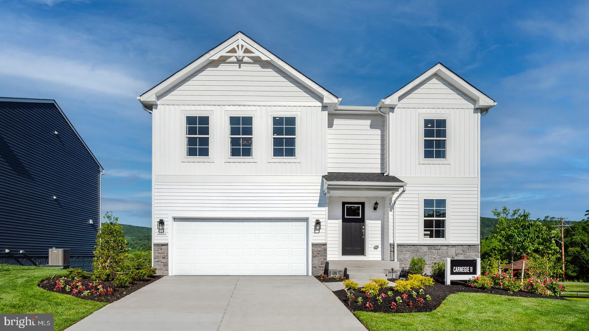 **OFFERING UP TO 15K IN CLOSING ASSISTANCE WITH USE OF BUILDERS PREFERRED LENDER AND TITLE.**
The most affordable luxury single-family home in Frederick County! Introducing the Carnegie II—a flagship design where sophistication meets comfort, all set against unforgettable mountain views that elevate every room.
• Grand, light-filled layout with a spacious family room and expansive windows that frame the surrounding natural beauty
• Gourmet-inspired kitchen with a large island, open dining area, and seamless flow—perfect for entertaining or quiet evenings at home
• Versatile main-level flex space, ideal for a private office, formal sitting area, or hobby room
• Elegant primary suite upstairs with a generous walk-in closet and a spa-like en-suite bath featuring dual vanities and luxurious finishes
• Three additional bedrooms and a conveniently located laundry room complete the upper level
• Included Finished lower level provides a flexible space for media, guests, or recreation—designed to evolve with your lifestyle
• All enhanced by sweeping mountain views that provide a sense of peace and connection to nature
• Two-car garage and high-end craftsmanship throughout for effortless everyday living
With limited homesites remaining, the Carnegie II offers a rare opportunity to own a statement home in one of Frederick County’s most scenic communities. Experience elevated living—inside and out.
*Photos may not be of actual home. Photos may be of similar home/floorplan if home is under construction.