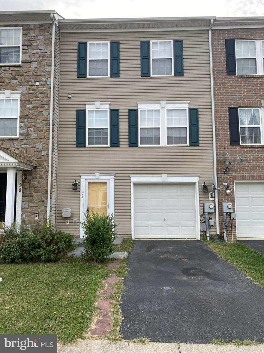 Spacious townhome with beautifully renovated kitchen, fresh paint, and updated flooring throughout! This 1-car garage unit features a 3-level bump out for extra living space, a private fenced backyard, and all 3 levels above grade. The main floor has two living spaces flanking the remodeled kitchen with granite counters, newer appliances, and ceramic tile backsplash. Upstairs are 3 bedrooms -- all with vaulted ceilings -- plus a light-filled primary bedroom with a large en-suite bath featuring a Jacuzzi tub, shower enclosure with glass doors, and double vanity. The entry level has a partially finished rec room with entrance to the fenced yard, laundry facilities, and space for your storage. Enjoy easy access to commuter routes, local amenities, and area attractions like historic Harpers Ferry, Charles Town Casino & Races, and more. This home is ready to be rented today and the location right off Rt. 9 can't be beat! No smoking. Pets allowed on case by case basis. Tenant responsible for Ambulance Fee. Zillow Application