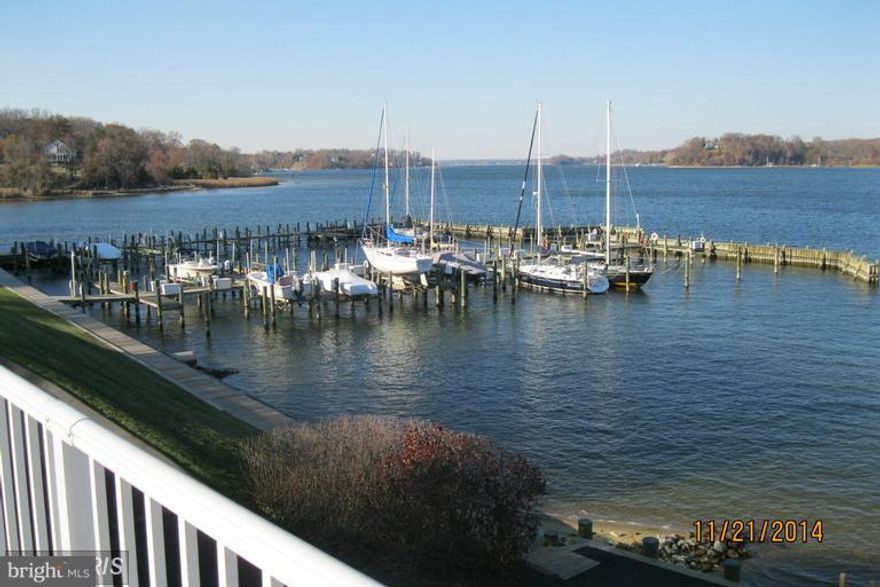 ***BEAUTIFUL DREAMS LANDING CONDO WITH A VIEW!!  THIS HOME SHOWS WELL AND IS COMPLETE WITH UPGRADED KITCHEN AND BATHS , BEAUTIFUL WOOD FLOORS,  COMMUNITY WITH POOL,  DEEP WATER BOAT SLIP RENTALS AVAILABLE