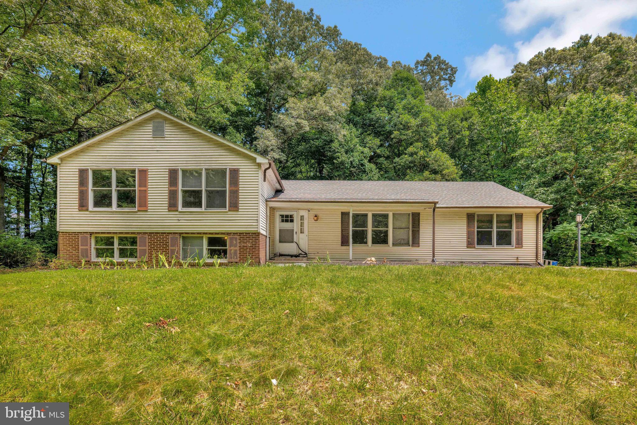 Nestled quietly off Route 301, this rare 5.2-acre property is a haven for nature enthusiasts. Imagine spending your Saturday mornings gardening or exploring trails along your own property line. For those who appreciate peace and serenity yet enjoy the occasional city adventure, Washington D.C. and Northern Virginia are just a quick 30-40 minute drive away. Daily conveniences are within easy reach, with major shopping centers only 7 minutes away along Route 5 or 301. This property offers a unique blend of tranquility and accessibility, providing the perfect balance for a peaceful and convenient lifestyle.