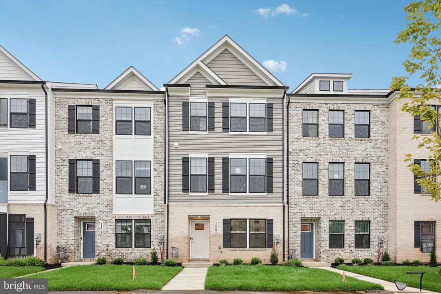 This 3-story open and contemporary floorplan that encompasses 4 bedrooms, 3.5 baths, and a 2-car rear load garage is STUNNING, and ready for a new homeowner this spring. Thoughtful design and modern luxury are uniquely embodied in this townhome plan, which features 1,763 sq ft of living space. It offers a spacious main level eat-in kitchen with white cabinets, recessed lighting, and a generous island providing plenty of cooking and entertaining space. The upper level boasts a private laundry closet and stylish primary bedroom, complete with a walk-in closet and dual vanities. The lower level features a finished 4th bedroom as well as a full bath. Hard surface flooring throughout the entire home offer modern luxury and contemporary appeal.  With black window trim and a black garage, the curb appeal of this home boasts an urban and modern feel that is sure to stand out.  This specific home provides direct views of the newly opened clubhouse.  Location within the community is also IDEAL with multiple guest parking spaces directly behind the home, and easy access to main roads leading in and out of the community.  Conveniently located across the street from tons of shopping and entertainment options. Incredible rates and closing incentive options available with the use of DHI Mortgage.