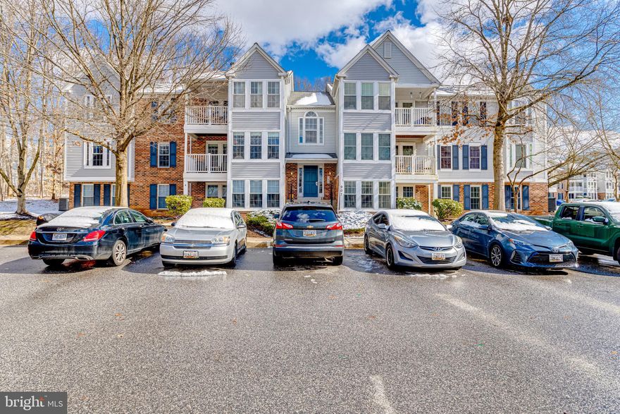 Great move in ready 2 bedroom ground floor unit with separate entrance.  Looking at the building, just take the walkway on the right to your private patio and enter through the French door.  This condo is vacant and in great condition with a living area, dining area, full kitchen, 2 bedrooms, laundry room and full bath and waiting for you to come claim it today!

Carpets have been professionally cleaned after pics were taken.