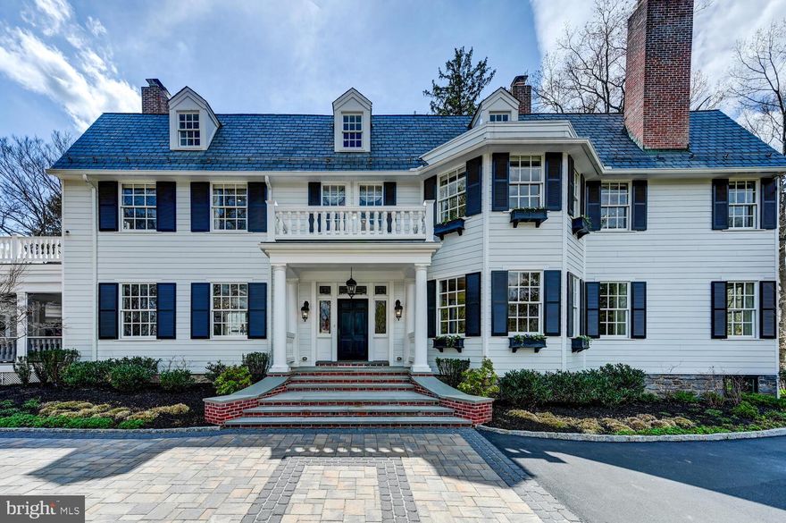 Located in Ruxton’s premier community of Circle Rd. Defined by master craftsmanship and every conceivable amenity along with recent renovations to perfection, this Ruxton home is for the most discerning buyer. Located at the crest of a semi private lane in the sought after area of Circle Road, this private 3-acre estate offers rooms of gracious proportions combining charming elegance with casual comfort and warmth, perfect for large family gatherings. Guests are greeted in the grand welcoming foyer with a stunning bridal staircase that is open to a spacious formal dining room and living room with fireplaces, coffered beam ceilings, exquisite moldings, gleaming rich hardwood flooring and French doors that open to a covered porch. An expansive kitchen family room awash with light from the newly added skylights was created to become the heart of the home with its rich built-ins, newly converted gas fireplace, rich furniture grade off white cabinetry, Carrara marble counters, HUGE breakfast island and all high-end professional grade appliances including two separate full size refrigerators with double freezer drawers, separate ice maker, and two full size wine refrigerators! An adjacent sunroom/main floor office overlooks the large outdoor hardscape with fireplace for alfresco dining and entertaining. A convenient back-staircase allows easy access to three bedrooms and 2 baths on level 2 including a lavish owner's suite with fireplace, sitting area, a room size custom fitted dressing room, a large luxurious white Carrara marble spa bath with silhouette soaking tub and large double shower, and French doors to a private porch that offers hilltop views. A convenient and spacious laundry room is also on the second floor. A bright and cheerful level 3 consists of a large bedroom/family hangout room/office with half bath, another office plus two more bedrooms and a bath. Outside a large yard with majestic trees awaits with a wrought iron gate opening to a beautiful parking courtyard and a detached 5 car heated/cooled garage (2015) with an amazing 1,000+ sq ft  upper-level gym and a bonus room that is ideal for a private office or playroom. Renovations in 2022 and 2015 included systems, all Hardi plank siding, skylights, new main roof, full landscaping, and a natural gas line to the house with a converted furnace, new gas fireplace, water heater and generator - AMAZING VALUE FOR THIS PROPERTY! VERY EASY TO SEE AND MOVE IN READY!  MOVE IN READY IN EXCELLENT CONDITION! Please do not drive up driveway without appointment.