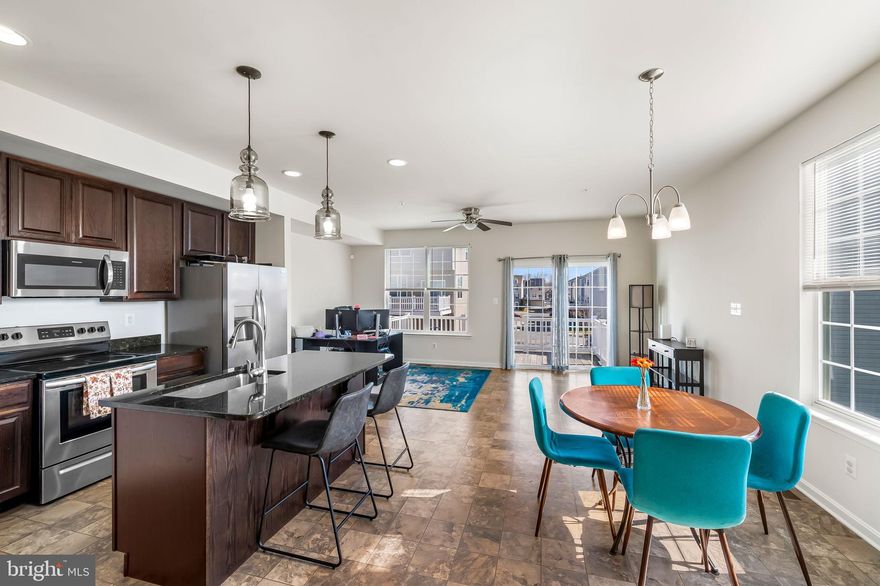 This is the one you've been waiting for!! If you're looking for more living space, a sun-drenched home that is only 6 years old and convenient to commuter routes and shopping, then you're in the right place!! Welcome home to 400 Charlestown Crossing Blvd. Situated on a large corner lot, this Bob Ward home is located on arguably the most desirable lot in the neighborhood and has absolutely everything you have been looking for. Also, as an end of group, this home has a surplus of natural light throughout! The upper level offers an oversized primary bedroom with a huge walk in closet and en suite bathroom with double sinks, water closet and an incredible walk in tiled shower with a seat! There are two additional bedrooms, a hall bath with a shower/tub combo and imagine never having to walk more than 10 steps to do laundry with an upper level laundry room! The main level offers a massive family room, a convenient half bath, a wonderful, large eat-in kitchen with granite countertops, cherry cabinets, stainless steel appliances and a large island with barstool seating! Off of the kitchen, you will enjoy a bright and sunny morning room/dining room/flex space area that leads out to your large deck! The lower (entry) level has another fantastic recreation room with a full bathroom rough-in, tons of storage and entry to the attached 2 car garage. The market is heating up and you truly do not want to miss this one so schedule your showing today!