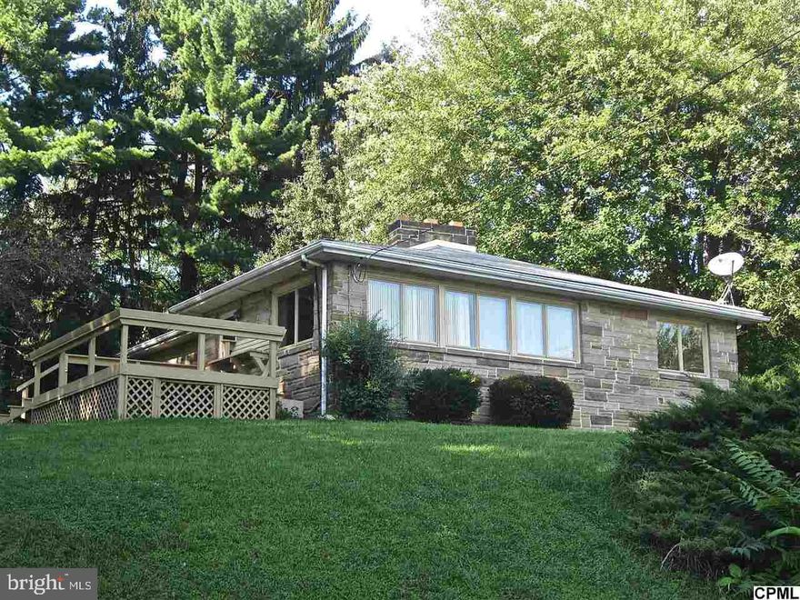 Are you looking for something unique with charm? Come check out this warm & cozy home located in a convenient location in CD Schools. 3 bdrms, 2 full baths. Lower level great for entertaining featuring bar, wood burning fireplace & full bath w/tile floor & walk-up whirlpool tub. New carpeting throughout home. 3rd bdrm would make perfect office! Central air- private corner lot. Lg deck off LR for enjoying those peaceful evenings!