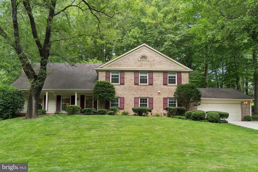 This stately Concord model sits on a gentle rise with charming front porch views of wooded green space. Located in the highly desirable River Falls community, this 4BR, 3BA Colonial is ready for its next chapter. Called “suburban splendor near the C&O Canal” and “a place where even little ones live large” (Bethesda Magazine, 7/23; Washington Post, 11/9/13), River Falls remains one of Potomac’s most sought-after neighborhoods. 
The main level features a tiled entry, formal living room with floor-to-ceiling windows, white oak floors, and a wood-burning fireplace. The kitchen includes an induction cooktop, two refrigerators, and a cozy breakfast nook overlooking the private rear yard backing to dedicated green space. The kitchen and family room both open to a large screened porch with skylights and grill with dedicated gas line—ideal for entertaining or family living. A versatile office/playroom/guest room, laundry, mudroom, and powder room complete the first floor. 
Upstairs, the generous primary suite includes a sitting room, walk-in closets, and full renovated bath. Two bedrooms share a Jack & Jill bath, while a fourth bedroom and hall bath provide flexibility. 
The unfinished lower-level offers 8.5'+ ceilings and is ready for transformation into a rec room, gym, or additional living space. 
Ideally situated near the River Falls swim and tennis club, playing fields, tot lot, and community center. Enjoy quick access to Bethesda, Tysons Corner, and all that Washington, DC has to offer, plus a short drive to Potomac Village with charming shops and dining. Whitman school district. NEW ROOF  only 2 months old.
Welcome home to the River Falls lifestyle!