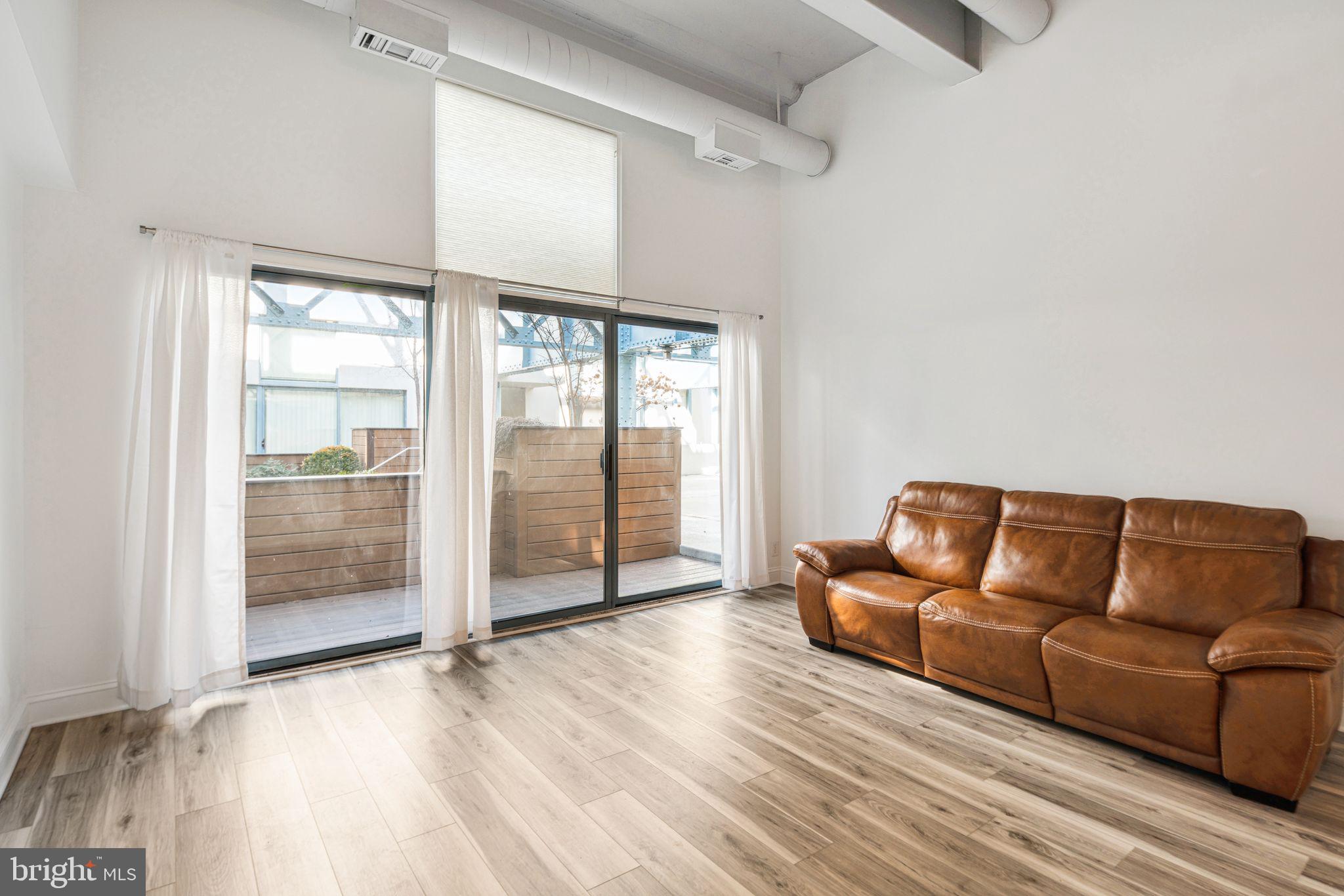 Welcome to Pier 3! This newly renovated unit is the perfect space to call home. On the first floor is the kitchen equipped with stainless steel appliances, soft close cabinets and granite countertops. The natural light that shines in from the atrium highlights a large living room with high ceilings and a sizable private patio through the sliding glass doors. The half bath and laundry nook are also on the first floor with hookups for a stackable washer and dryer and a newly added tankless water heater. Upstairs is the full bath and bedroom that opens to the 2nd floor balcony. The indoor pool looking over the water, and full gym are a great way to stay active in cold weather or cool off in the hot summers. Just out the pool doors is access to the common deck space at the end of the pier where you can sit out on the lounge chairs as the river flows by and enjoy spectacular views of the Ben Franklin Bridge, watch boats sail by or take in the many nights of fireworks. Located on the waterfront in Olde City, you’re steps away from the many Penn’s Landing and Delaware River activities, shopping, restaurants and pubs, and are close to all major highways.