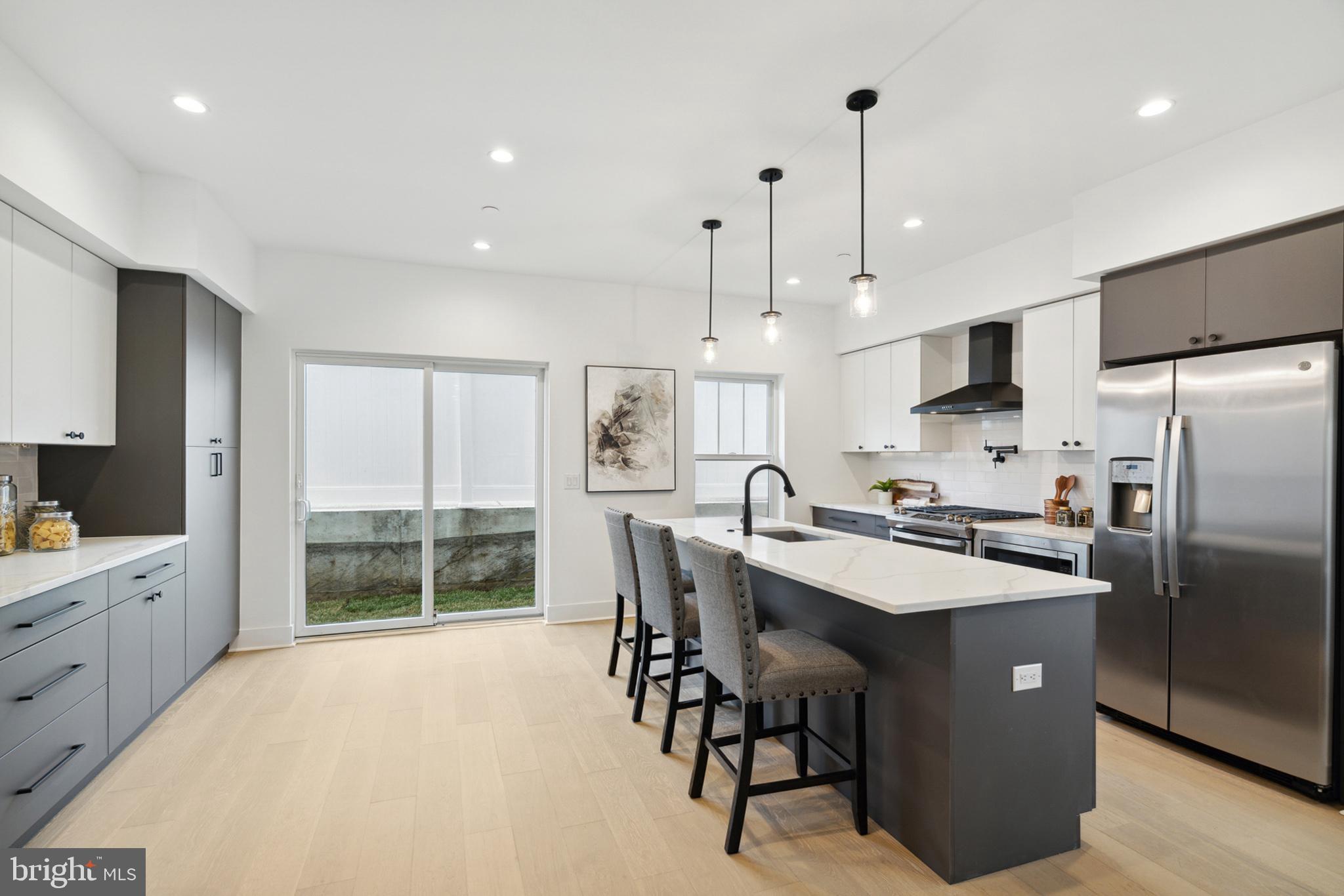 ONLY 2 HOMES LEFT AVAILABLE!! Welcome to the premier new development townhome community, Torresdale Manor! This highly anticipated community is located in the Torresdale section of Northeast Philadelphia and will be the talk of the town! Torresdale Manor is a 30 townhome community with 3 design options for buyers to select their finishes from. Each home in this community features 4 bedrooms, 3+ bathrooms, 2 car parking driveway with onsite guest parking, stunning chef's kitchen with a high-end stainless steel appliance package, outdoor deck off of the kitchen, spacious rear- side yard, modern top-of-the line finishes and options for stunning upgrades! DONT FORGET, these homes also come with a 10 year tax abatement and 1 Year Builders Warranty.