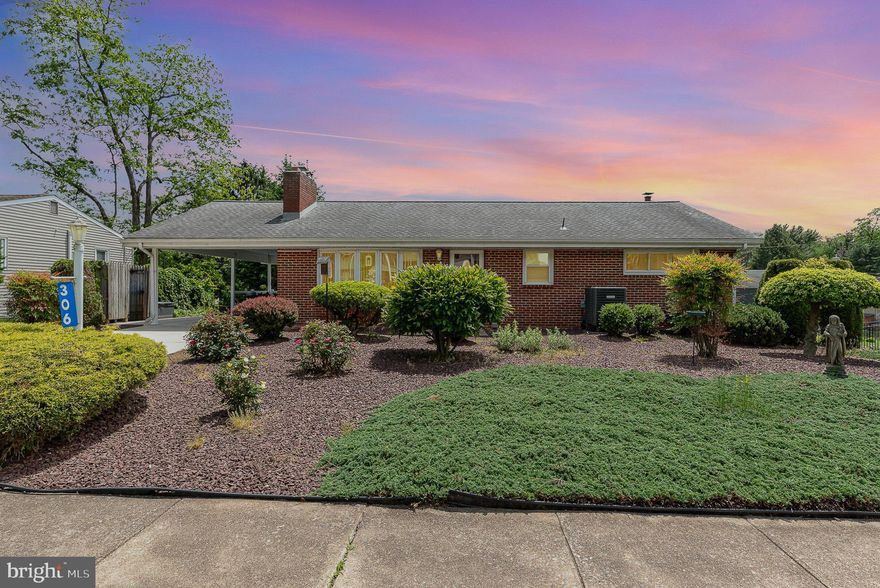 First Floor Living at its Best in this Beautiful, One-Story, Brick Ranch Home. Enter Through the Front Door or the Carport Area Which Doubles as a Entry Level Patio or Sitting Area.  Three or Four Bedrooms, 2 Full Bath (One Up, One Down),Gorgeous Original Hardwood Floors, Separate Dining Room, Fantastic Bright, White Kitchen with Plenty of Cabinets, Living Room with Gas Fireplace, Built-In Shelving Surround, Finished Family Room in Lower Level with 4th Bedroom, Full Bath, Laundry Room, Utility Storage, and Workshop, Walk Outside onto Your Gorgeous Deck Overlooking the Flat, Rear Yard Where the Birds Come to Sing Their Songs.  Also, two Sheds.  All Utilities in this Home are New within 3 Years.  Nothing for You to do except, Live Life and Enjoy the Peacefulness.  Call me TODAY for a Private Tour.