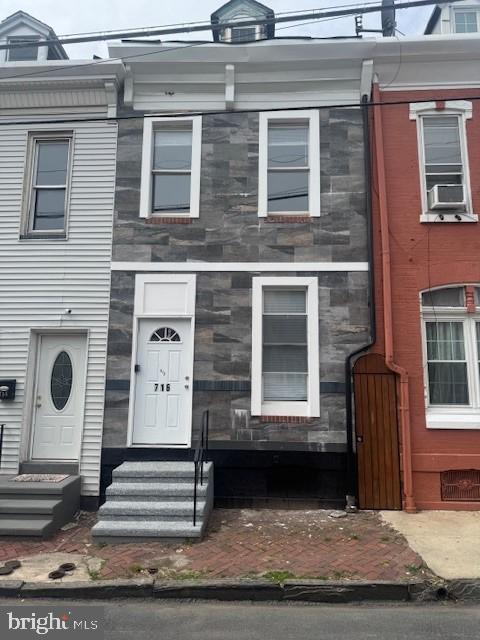 Completely renovated 4 bedroom 2 bath house! Beautiful stone front, all new fixtures, new kitchen, baths, paint and water proof laminate floors. Tour today to see this hidden gem!