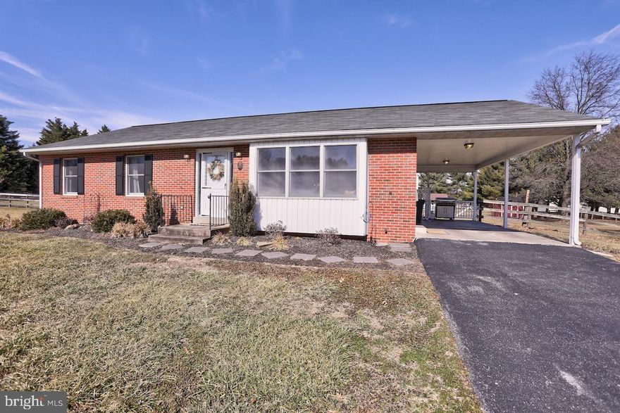 One level Home resting on 2.4 acres!  This beautiful property has been fully renovated inside- Hardwood Flooring in the Living Room and Dining Room areas, Gourmet Kitchen with upgraded cabinetry, granite counter tops, and stainless steel appliances complete with a quaint built-in breakfast nook with window seating! 3 Bedrooms including the Primary Owner Suite with attached private bath. Fully unfinished lower level ready to be finished to add even more living space! 1 car Covered Carport attached, Paved Driveway, and fenced rear yard with storage shed. *HVAC less than a year old* *Appliances replaced in 2021*