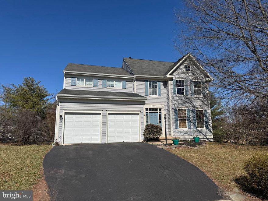 Come and see this lovely colonial style home with 4 bedrooms, 3.5 bathrooms, and over 3000 Sq. ft of living space, located on a quiet cul de sac in the Johnson Estates community.  9ft ceilings on main level.  Center island kitchen - Spacious family room, Fireplace & door to deck – Large finished walk-out basement with full bathroom - with all of Wellington's great amenities.  Close to VRE, shopping, pool, tennis, walking trails.