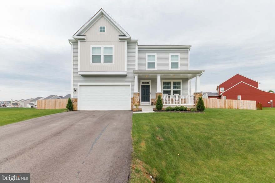 Cumberland II Model with tons of upgrades @ Springdale Farm! Modern Craftsman style home features over 2900 sq ft with 4 beds, 2.5 baths and bonus Morning Room with vaulted ceilings. This home is open concept living at its finest! Expansive kitchen offers a large island, walk-in pantry, Quartz counter tops and tile back splash. Mudroom is spacious with coat closet, private powder room and direct access to 2-car garage. Family room is inviting with electric fireplace and plenty of windows for natural light. Front sitting room is open to foyer and has an additional coat closet. Upper level is super spacious with primary bedroom and 3 secondary bedrooms. Primary bedroom features vaulted ceilings, walk-in closet and en suite bath with dual vanity and custom tiled shower. The 3 secondary bedrooms are larger than normal room sizes and share a spacious full hall bath with dual vanity. Lower level is ready to make your own with bathroom rough-in. Walk-up stairs take you to your fenced-in backyard. Home has been meticulously cared for. Deck and fence just installed 2023. Custom paint 2023. Water softener 2023. Welcome HOME!