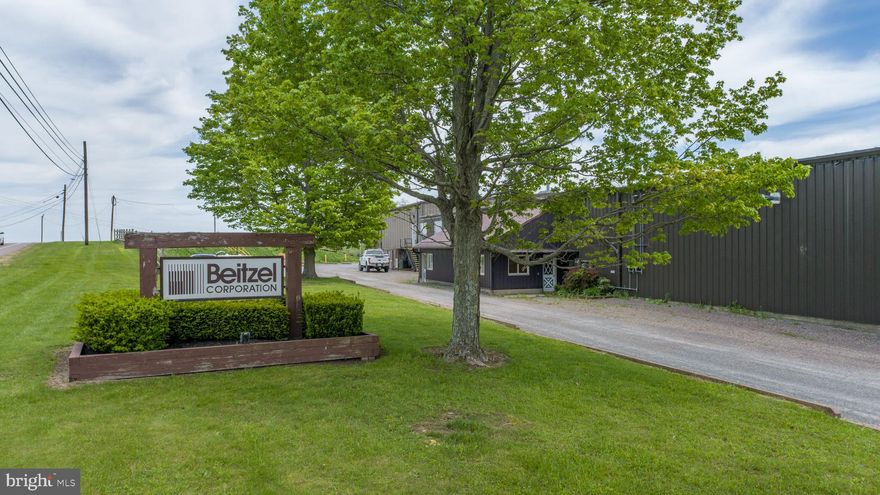 Commercial & Industrial Facility on 31+ Acres – Prime Location!
An exceptional opportunity to acquire a 31.19 acre commercial/industrial facility with robust infrastructure and flexible development potential. This property is ideally suited for manufacturing, logistics, or expansion-focused enterprises.
Key Features: 34,000 sq ft shop building with: Multiple offices, 4 bathrooms, 8 overhead doors, Loading dock, Full-length overhead industrial hoist system, On-site well & septic systems, Floor plan available, plus a 7,500 sq ft pole building with: 5 overhead doors , Floor plan available. Two (2) 600-amp 3-phase electric services: One 240 Volt , One 480 Volt , Multiple State Highway Entrances, Outside zoning jurisdiction – no CAM fees, Close proximity to Interstate 68 for strategic regional access, Subdivision potential for future development or investment. This property combines size, location, and utility access—making it a rare and valuable opportunity for commercial or industrial use. Contact us today to schedule a tour and explore the potential this facility has to offer!