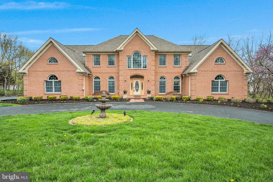 Experience unparalleled luxury in the prestigious Pinehurst community, within the Cumberland Valley School District. This stunning estate boasts 9 bedrooms, 7.5 bathrooms, and over 9,500 sq. ft. of thoughtfully designed living space, combining 7,000 above-grade and 2,500 below-grade square feet. The grand foyer impresses with soaring two-story ceilings, a chandelier on a lift, granite floors to match the kitchen, and a sweeping curved staircase. Entertain effortlessly in the formal dining room with a wet bar. The open-concept kitchen features a large island with granite countertops matching the custom made dinette table. The kitchen flows seamlessly into the spacious family room.  The sunroom with skylights floods the main floor with beautiful natural lighting.  The main floor also includes a half bath, laundry, main primary suite with walk-in and cedar-lined closets, a spa-like bath, private office, prayer room, and in-law quarters with a full bath. Upstairs, a spacious loft, 6 additional bedrooms, and 3 full baths provide ample space for guests. The lower level is an entertainer's dream with a great room and a three-sided fireplace, dance floor with built-in speakers, a fully equipped kitchen, arts and exercise rooms, and 3 storage rooms. Convenient access from the 3-car garage to the basement. Outside, enjoy your private oasis with a covered patio, expansive deck, lighted pickleball/multi-purpose court, and extensive hardscaping—ideal for relaxing or hosting gatherings. This home is the perfect blend of grand elegance, thoughtful design, and exceptional amenities. Don't miss this rare opportunity to own in one of the area's most coveted communities - schedule your private tour today.