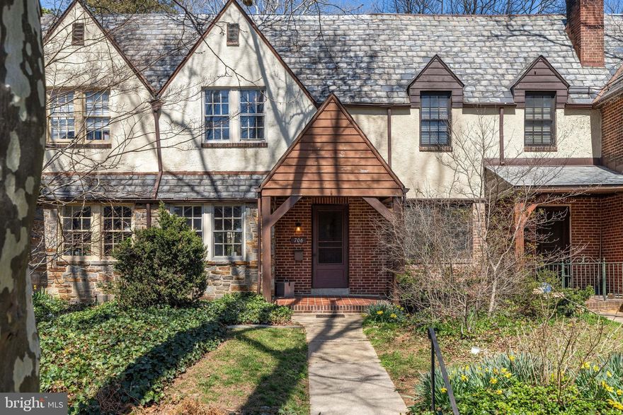 Set along a romantic, sycamore-lined street just a 10-minute walk to Belvedere Square, 706 E Lake Ave is a picturesque Tudor that blends timeless charm with everyday livability. A welcoming front porch entry leads into a light-filled main level featuring a beautiful bay window, charming archways, a true dining room, and an additional eat-in or flex space perfect for a breakfast nook, office, or play area.

Upstairs offers three spacious bedrooms, including one with a large closet and another with access to a private balcony—ideal for enjoying quiet mornings or evening breezes. The full bathroom is generously sized and thoughtfully updated with newer fixtures while maintaining its classic character.

The lower level provides additional living space, ample storage, a cedar closet, and a convenient half bath, offering flexibility for a variety of uses.

Outside, the fully fenced backyard is low maintenance and features a covered porch, creating a great space to relax or entertain. A garage located just across the alley adds everyday convenience.

A storybook Tudor in an idyllic setting with walkable access to one of the area’s most beloved neighborhood destinations.