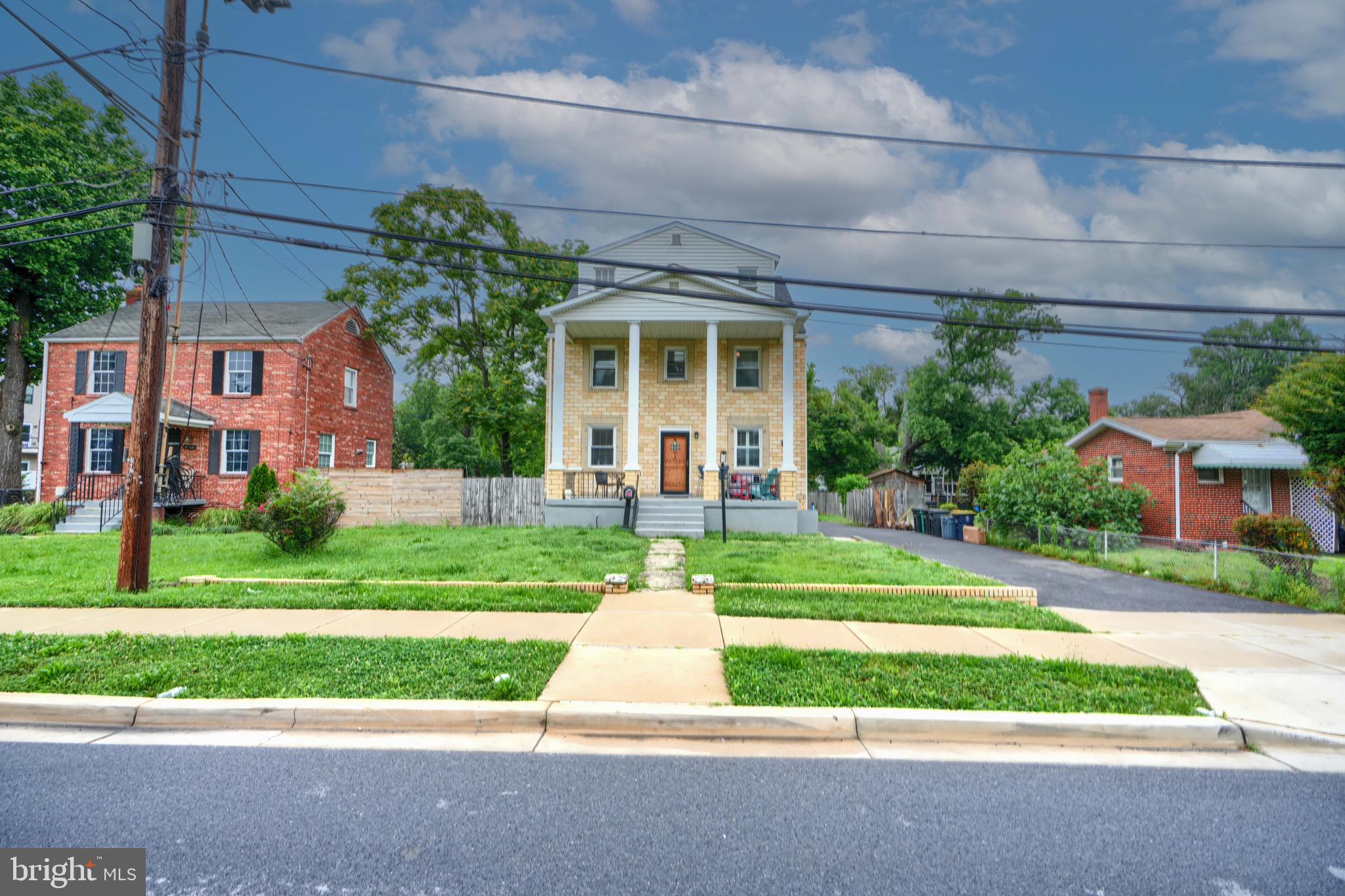 Welcome to this unique colonial masterpiece nestled in the heart of Prince George’s County. This stunning three-story home, complete with a basement, offers a spacious and elegant layout. On the first floor, you'll find a beautifully appointed kitchen with stainless steel appliances, a dining room, living room, family room, and a den with a convenient half bathroom. Hardwood floors run throughout, and the abundance of natural light leads you to a spacious rear deck—perfect for relaxing. The second floor boasts a cozy sitting room, two bedrooms, a den, and the main bathroom. On the third floor, there are two additional bedrooms, two center rooms, and another bathroom, providing plenty of space for comfort and privacy. Attached to the property is a studio with a one-car garage, while the backyard offers a concrete patio and a large fenced for outdoor entertainment and enjoyment. The fully finished basement, with a separate entrance, includes its own kitchen, living room, dining room, two bedrooms, two closets, and a bathroom—ideal for guests or extended family and rental opportunities. This is truly a must-see property, filled with charming details and hidden gems. Just minutes away from Washington, D.C., a mile from the metro station, and a short drive from Andrews Air Force Base.