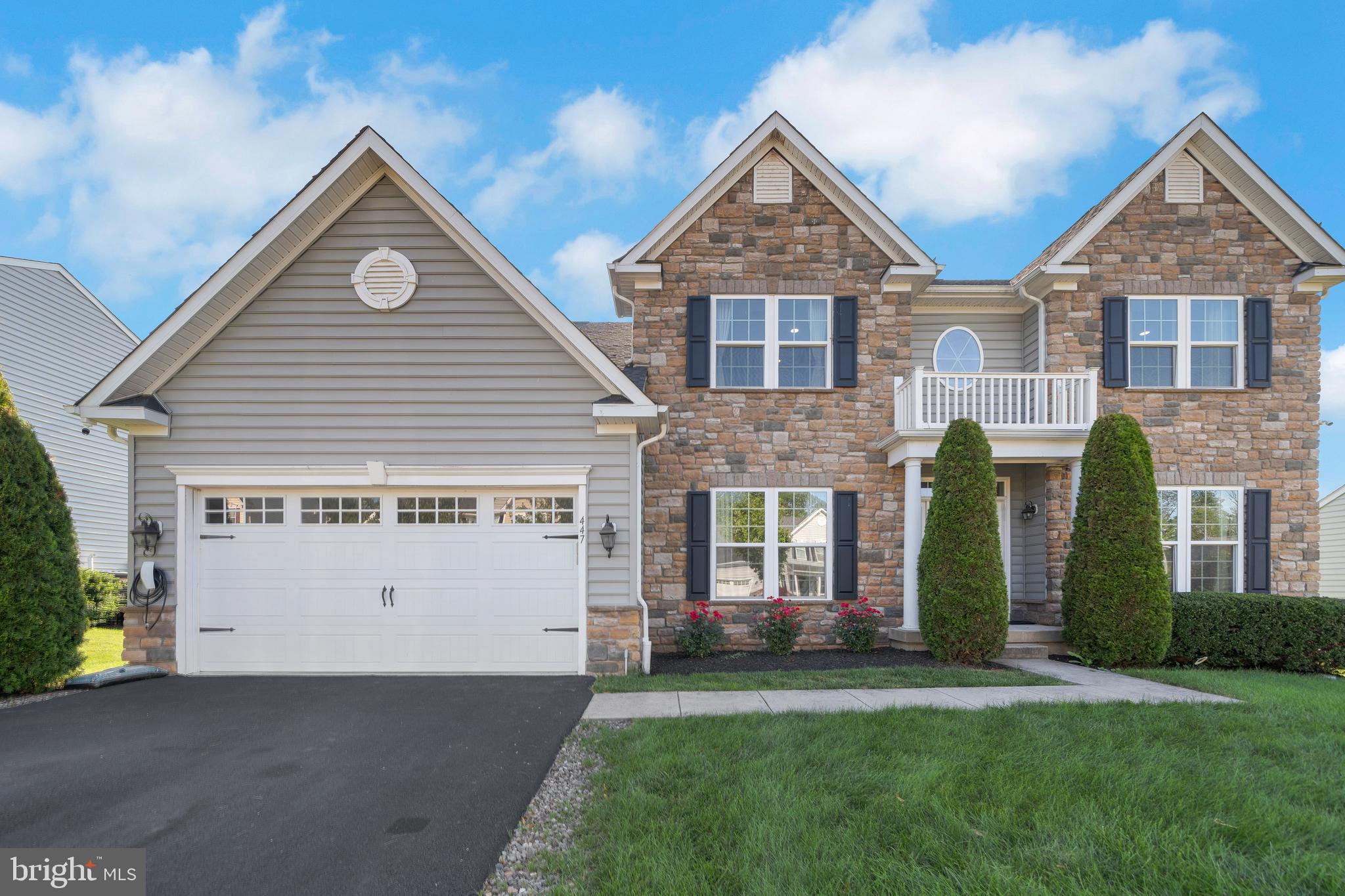 A Sunset Sanctuary in Hilltown Walk – Where Comfort Meets Connection
Welcome to 447 Maregan Drive—an exceptional blend of elegance, warmth, and soul. Nestled in the sought-after Hilltown Walk community, this meticulously maintained Colonial invites you to experience a lifestyle where every sunset feels like a private masterpiece. Step through the front door and into over 4,500 square feet of thoughtfully designed living space. Hardwood floors lead you into the heart of the home: a gourmet kitchen with granite countertops, an oversized island, and a sunlit breakfast room that opens to a spacious family room anchored by a raised-hearth stone gas fireplace—perfect for cozy evenings and meaningful conversations. Whether you’re hosting holiday meals in the formal dining room, working from the French-door home office, or winding down with a movie in the dedicated media room downstairs, every room offers comfort and flexibility for modern living. The finished basement adds bonus space for entertainment, fitness, or hobbies—all without the compromise of outdoor access.
Retreat upstairs to your private owner’s suite, complete with double walk-in closets, a sitting area, and a spa-inspired bath featuring granite dual vanities, soaking tub, and walk-in shower. Three additional bedrooms and a hall bath provide space for family and guests alike. But the showstopper? Step out onto the composite deck at golden hour, where breathtaking sunset views stretch across tranquil greenspace. It’s a daily invitation to pause, reflect, and reconnect—with nature, loved ones, and yourself. Located on a peaceful drive in a community rich with natural beauty and connectivity, the home backs onto a scenic walking trail that leads to Hilton Community Park with a soccer field and playground and continues to Al Reese Park—ideal for weekend play and peaceful strolls. Commuters will love being just 10 minutes from Colmar Train Station, offering a direct and easy ride into Philadelphia for work or play. Just minutes to Lake Nockamixon, Peace Valley Park, and key commuter routes like 152, 309, and 113, this home offers the rare blend of serenity, access, and inspired living.