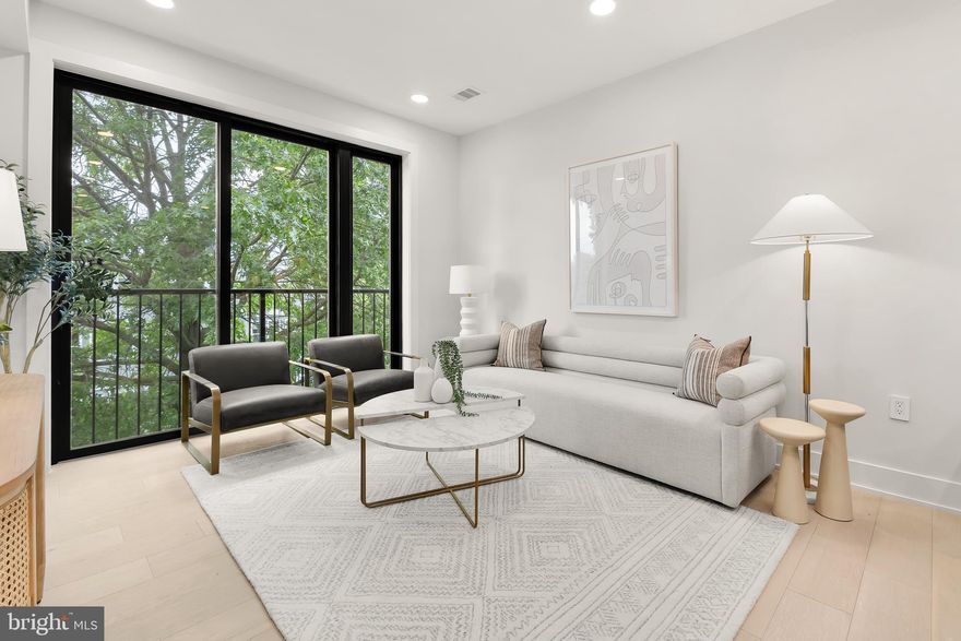 Welcome home to this spacious and beautifully appointed 2 bedroom, 2 bathroom residence at Dahlia on Fourteenth—a boutique new construction building nestled just off vibrant 14th Street.

Tucked away on the tranquil, dead-end block of Shepherd Street, this home offers rare peace and privacy in the heart of the city. Thoughtfully designed, the layout combines elevated finishes with everyday comfort. Enter through a premium rotary birch wood door in a dark walnut finish and step onto wide-plank white oak engineered hardwood floors that run throughout the unit. Enhanced soundproofing with ¾” gypcrete over ¼” sound mat ensures a quiet retreat from the world outside.

The gourmet kitchen is both striking and functional, featuring dual-tone cabinetry, sleek quartz countertops, and a full suite of Samsung appliances—perfect for entertaining or cozy nights in. Expansive floor-to-ceiling Andersen windows  which open to a Juliet balcony frame the lush, green views of Shepherd Street, filling the open-concept living space with natural light. 

The primary suite is a calming escape, complete with a spacious closet and a spa-inspired bathroom adorned with a walk in shower, Porcelanosa tile accents, and Delta fixtures. A well-appointed second bedroom and full bath provide flexibility for guests or a home office.

Modern conveniences include a Nest thermostat, in-unit intercom system, and ample storage. The quiet residential setting is just moments from Rock Creek Park and mere steps to some of DC’s best local restaurants, cafes, and shops along 14th Street.