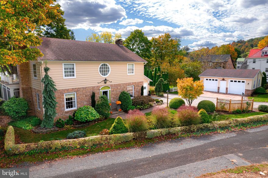 Welcome to 428 Grove Lane, an elegant stone colonial nestled in the heart of Bedford. As you step inside, you'll be captivated by its charm. This beautifully maintained home boasts three spacious bedrooms, three full baths, and one half bath. A cozy office/den provides a perfect nook for reading. The formal dining room offers stunning views, while the expansive living room with a gas fireplace is ideal for hosting. The kitchen is well-equipped with ample storage and counter space, perfect for social gatherings, and comes with a refrigerator, range, oven, dishwasher, and microwave. Enjoy the serene outdoors on the lovely, screened porch, overlooking meticulous landscaping. The upper level houses the master bedroom with an en suite bath and an outside sitting area for morning coffee. Two additional large bedrooms and 1.5 baths complete the upstairs. Hardwood floors add elegance throughout the home. The basement features a vast recreation area, full bathroom, a utility room, and includes a washer/dryer. With plenty of parking and a three-car garage, this home is just blocks away from the vibrant downtown Bedford, local shops, and schools. Fall in love with 428 Grove Lane today!