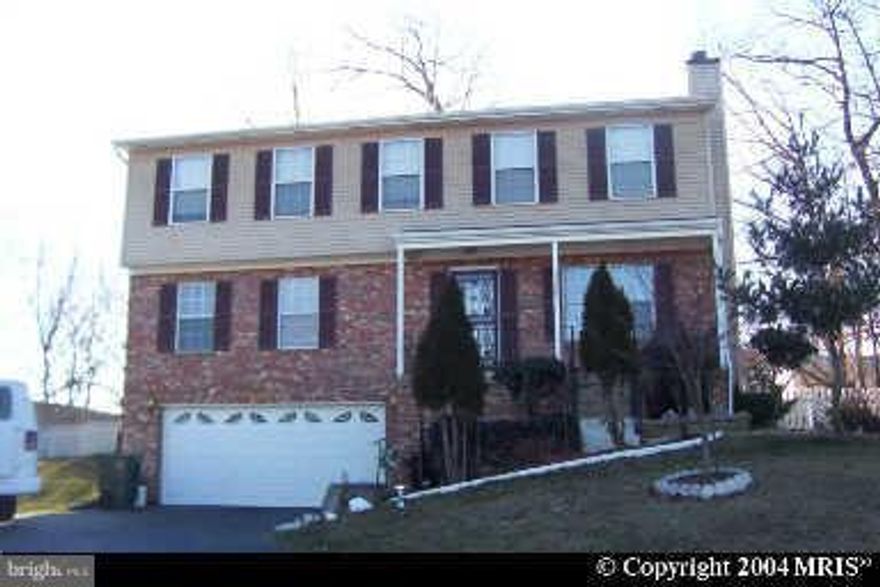 Beautiful Large 4 bedroom 3.5 bath home with 2 car garage located on almost 1/2 acre lot conveniently located near the heart of Dale City. Upgraded Neutral carpet and Freshly Painted, Family room with fireplace,4 Bedrooms all on same level, Sliding glass door to deck that overlooks level fenced back yard. Home looks Great and Ready for New Tenant!