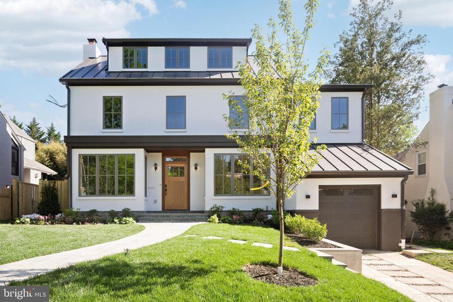 Discover the epitome of modern luxury in this brand-new construction meticulously crafted by JLP Contractors, Inc and KUO Studios. Ideally situated in the highly sought-after neighborhood of AU Park on picturesque Warren St, this residence is a masterpiece of design, blending seamlessly with the vibrant community and providing easy access to the charming restaurants and shops along Mass Ave.
The open yet transitional design of the home creates a sense of spaciousness and sophistication, facilitating a seamless flow between rooms. Natural light floods the interior through oversized Windsor windows, offering breathtaking views of the surrounding area, extending all the way to Virginia. The first-floor, with its 9-foot ceilings and 4" white oak flooring, provides an elegant canvas for both daily living and entertaining. 
Luxury amenities abound, including a wood-burning fireplace for cozy evenings, Wolf and SubZero appliances in the gourmet kitchen, and a 2 unit, 3 zone HVAC system ensuring comfort throughout. The primary bedroom boasts a private roof deck, while the rear of the house features an open porch overlooking a beautifully landscaped garden—an oasis of tranquility within the heart of DC.
The exterior, offers a stucco finish and a stone front walk and steps. Residents can enjoy the convenience of walking to nearby restaurants, stores, and amenities, immersing themselves in the vibrant energy of the neighborhood. Despite its central location, this residence provides a sanctuary of peace, minutes away from downtown DC and Maryland, offering the perfect balance of urban living and suburban tranquility. Welcome to a home where every detail reflects comfort and elegance. Lower level and Primary bath were not yet complete for this photo session.  They are magnificent!