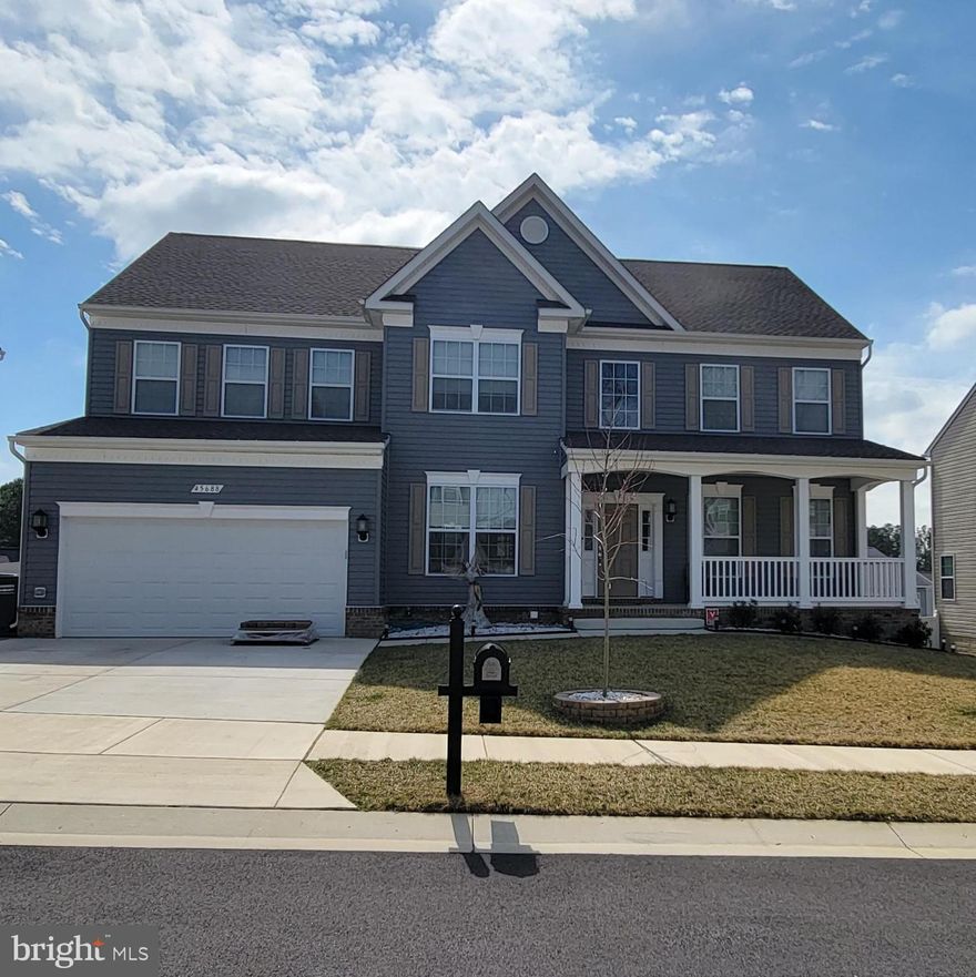 Welcome to this stunning 6 bedroom/4 bath colonial home in the highly sought-after neighborhood of Elizabeth Hills, just 10 minutes from NAS Patuxent River.  This spectacular home features spacious rooms with many upgrades throughout.  The neighborhood is established and friendly with multiple children's play areas, quiet roads, and children of all ages.  The large gourmet-style kitchen is an entertainer's dream with granite countertops, tiled backsplash, oversized island, double wall ovens, cooktop, black stainless-steel smart appliances, and a gorgeous sunroom to top it all off.  Also on the main floor is a formal living/sitting room, formal dining room, family room with a beautiful shiplap wall, office with French doors and powder room.  Venture upstairs via the waterfall staircase with access from both the foyer and kitchen.  The second floor includes four large bedrooms, an oversized master suite, second floor laundry room and full bathroom with double vanity.  Master suite includes a huge 13-foot walk-in closet and master bath with dual vanity sinks, tiled walk-in shower, soaking tub, and separate water closet.  The finished basement offers many use options with separate entrance and boasts a large family room, kitchen with granite countertops, sixth bedroom, large den/office, full bath with double vanity and second laundry room in the unfinished storage space.  Sliding doors take you out to a nice fully fenced backyard with firepit.  The two-car garage has several built-in shelves for additional storage.  Special home features to note are two tankless water heaters which ensure an endless supply of hot water, solar panels, whole house sprinkler/fire suppression system, thermal insulated blinds on all windows, alarm system, and underground 500-gallon propane tank.  This jewel of a home is less than two years old and comes with a 10-year home warranty.  Many other custom touches!  This home is a must see and won't last long, so schedule your showing today!  Professional pictures coming soon.