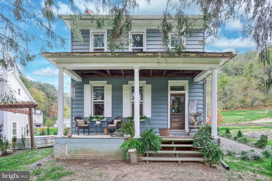 Super cute colonial in Spring Grove Schools situated on the bike and hike trail, at Glatfelter Station just outside of Seven Valleys.  Fabulous kitchen with newer stainless steel appliances, island , fireplace with woodstove and cabinets galore.  NEW water heater and NEW replacement windows through-out.  3 nice size bedrooms, and an attic for storage or finish it for additional living space.   Huge yard with chicken pen and raised bed gardens.  Sit on your front porch or balcony and enjoy your morning coffee or tea, country living at it's finest but not too far from schools, shopping and major routes for commuting.