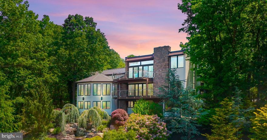 Welcome to this remarkable award-winning contemporary luxury property in the breathtaking hills of Bedford County, PA. This architectural masterpiece, recipient of the esteemed AIA Design Excellence Award, offers a truly unparalleled living experience. Spanning over 12,126 square feet, this expansive residence boasts magnificent views and an array of exceptional features.

As you step inside, you are greeted by a grand octagonal dining room, providing a unique and elegant space for entertaining guests. The spaciousness of the property is further accentuated by six luxurious bedrooms, four full baths, and two half baths, ensuring ample accommodation for family and visitors alike.

Indulge in the ultimate relaxation within the large indoor heated pool, accompanied by an eight-person hot tub, an enviable amenity that will rejuvenate your senses. The environmental room offers additional opportunities for pampering, with a sauna, tanning bed, and a refreshing rainforest shower. Moving through the residence is a breeze, thanks to the convenience of a mini elevator.

The stunning wooded and country views can be savored from multiple vantage points, including the octagonal deck with a cozy firepit, providing the perfect setting for outdoor gatherings. A spiral staircase adds a touch of elegance, while a wood-burning stone fireplace exudes warmth and sophistication.

For car enthusiasts, this property boasts a three-car attached garage and an impressive eight-car detached garage with RV parking, totaling over 3,500 square feet. The professionally designed landscaping, along with a pondless waterfall, creates a serene atmosphere that complements the property's natural beauty.

Situated on 31 acres of rolling meadows and woods, this private estate offers tranquility and seclusion, making it an ideal retreat from the bustling city life. Its prime location provides convenient access to I-99, placing it centrally between Pittsburgh, Washington DC, Harrisburg, Fairfax, and Baltimore.

Whether you seek a luxurious family residence or a prestigious corporate retreat, this one-of-a-kind property has it all. Impeccably designed, meticulously maintained, and surrounded by captivating vistas, this contemporary masterpiece truly sets the standard for upscale living. Don't miss the opportunity to make this extraordinary property your own.