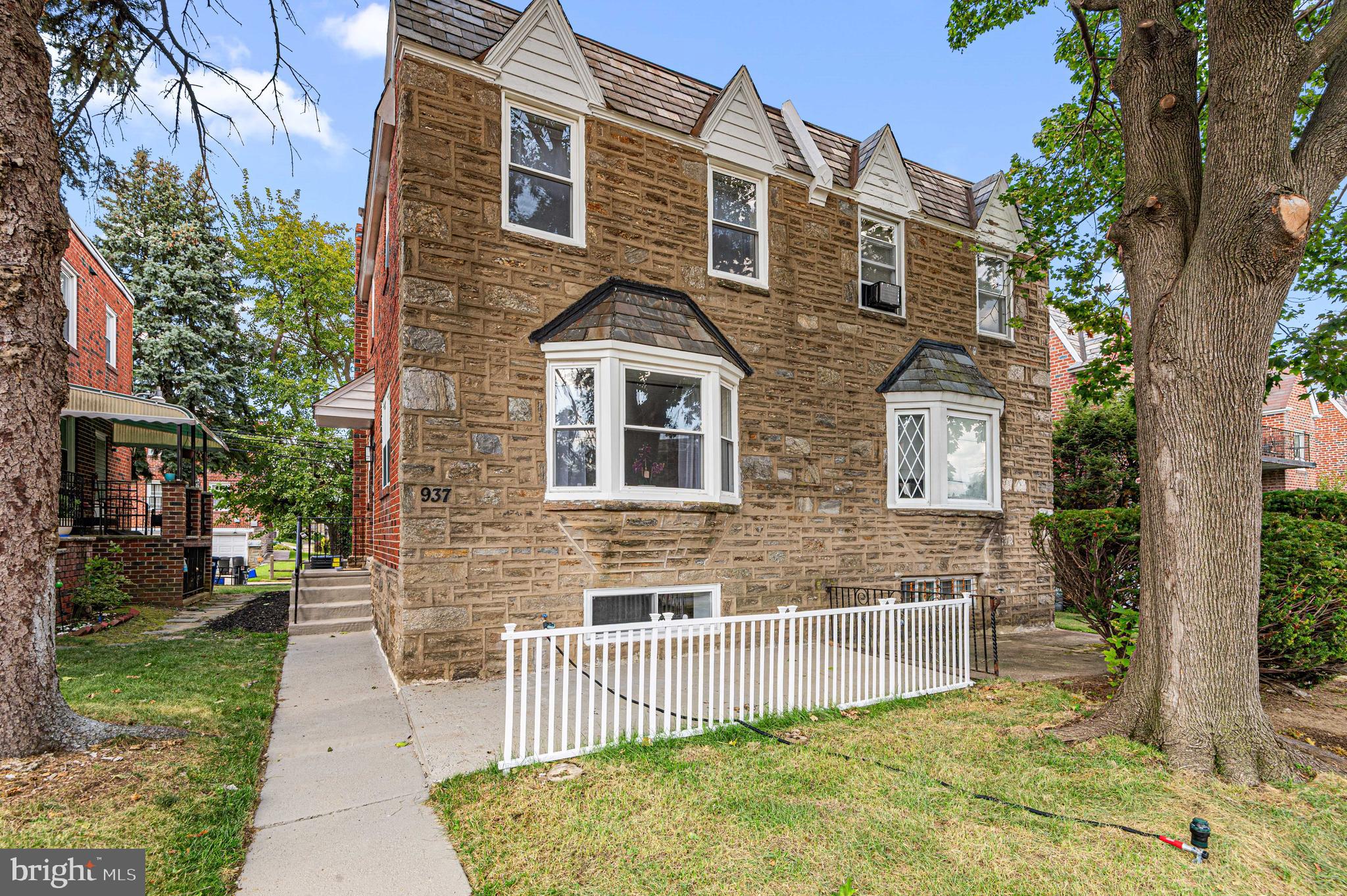 Welcome to Mt. Airy—a diverse residential neighborhood in Northwest Philadelphia, celebrated for its leafy streets, historic charm, and modern, hip atmosphere!
Seize this opportunity to make this elegantly renovated 3-bedroom, 3.5-bath Twin Home yours! Built with solid stone and brick, this remarkable residence is a true treasure, showcasing a generous open layout and high-end modern updates throughout, with New Flooring, New Windows, Doors, HVAC and much-much more.
From the moment you enter, the warm and stylish living room invites you in with its contemporary feature wall, complete with a sleek built-in fireplace and TV hookup. The All-New, Modern White Kitchen is both beautiful and functional, featuring a Central Island, granite countertops, Stainless Steel Appliances, and a cozy dining area. A rare bonus, the full-size walk-in pantry provides ample storage.
Upstairs, the primary suite offers a peaceful retreat with a sophisticated Fully Updated en-suite bath, frameless glass shower, elegant tile work, and a bright window that fills the space with natural light. Two additional bedrooms and a beautifully updated hallway bath complete the second floor, combining comfort and style.
The fully finished basement was designed as a Private Studio (or optional 4th bedroom) and includes its own bathroom (with a shower), kitchenette, and entertainment wall with a fireplace. With a private entrance, this versatile space is perfect as a guest suite, in-law quarters, or even a rental opportunity.
Step inside and you’ll instantly feel at home—this property perfectly balances contemporary design with everyday comfort. Move right in and start enjoying an elevated lifestyle in this truly special home!