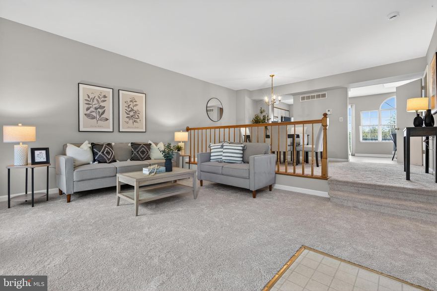 Welcome to popular Patapsco Falls, very close to the Trolley Trail for great biking & walking. This home was just freshly painted in many rooms, new carpet installed in the living room & dining area, and luxury vinyl plank flooring in the kitchen. The eat-in kitchen has great natural light with amazing views all year of trees. The refrigerator was replaced in  2025. There is a large deck off of the kitchen with the wonderful views as well--like an open space treehouse. The finished basement is spacious & provides a walk out entrance to backyard. Other updates include water heater in  2025. This home is located close to Catonsville's & Ellicott City's shops, restaurants, parks, great schools, etc.  Life is Great in 21228!