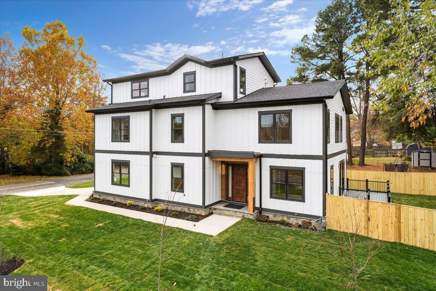 Rare opportunity for stylish new build in highly desirable Waynewood School area just a short walk to all Hollin Hall Shopping Center has to offer! 5 beds/5.5 baths across 3 levels totaling almost 4,300 total square feet plus extensive outside living space including deck off main level and deck off top level providing sweeping Western sunset views. Bright and airy interior featuring open concept living with expansive windows and soaring high ceilings. Many special features including: convenient mudroom built ins off of 2 car garage, main level office, 2 fireplaces, custom lighting throughout, spacious primary suite with 2 walk in closets and large bath, top level with private suite and rec room space, and every bedroom has its own private bath! Stylish exterior featuring stone foundation, wood front door and column,  board and batten trim, and black windows. Just move in and enjoy all this special home and surrounding area has to offer! *Image is digitally generated. Finished product may differ slightly*