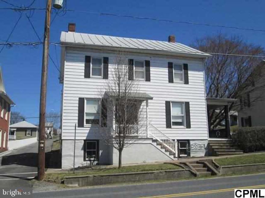 Nice home w hardwood floors & trim on much of first floor,wrap-around side porch w/ side yard, detached 2-car garage w off-street parking. Updated baths, freshly painted kitchen w/ built-ins & corner cabinets. Foyer/parlor/sitting rm Inspection reports available for buyers.  Contact agent for details.
