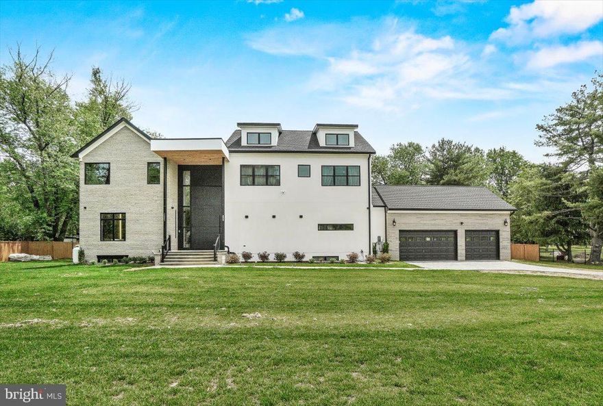 Ask about current jumbo financing options as low as 5.875% (7-year ARM through Citi Bank). Information available upon request. 

Welcome to 15807 Thompson Road, an exceptional custom-built estate nestled on 1.5 serene acres in Silver Spring, MD. This modern residence offers nearly 8,000 square feet of thoughtfully designed living space, with 7 bedrooms and 5.5 bathrooms, perfectly blending elegance, comfort, and functionality.

Step inside to a grand entrance featuring Porcelanosa tile, custom doors, and designer lighting that set the tone for the home’s sophisticated style. The main level showcases expansive sliding doors that invite indoor-outdoor living and create an effortless space for entertaining. A private office on this level provides the ideal setting for working from home in style and comfort.

At the heart of the home is a chef’s dream kitchen—equipped with a Sub-Zero fridge and freezer, high-end appliances, custom cabinetry, an oversized island, and a hidden walk-in pantry. A private wine cellar adds a refined touch for the enthusiast.

Upstairs, the second level is anchored by a luxurious primary suite offering a private balcony, a custom California closet, and a spa-inspired ensuite bath. Two additional spacious bedrooms share a Jack and Jill bathroom, while a conveniently located laundry room completes this floor.

The third level offers remarkable flexibility, featuring three more bedrooms, a full bath, and a generous living area—ideal for guests, multigenerational living, or a private retreat.

The lower level continues to impress with a kitchenette, a bedroom, a gym, and a spacious bonus room—perfect for a home theater, studio, or additional living space. It also features two full bathrooms and a second laundry area, providing added convenience for daily living or extended stays.

Outside, the expansive flat yard offers endless possibilities—whether you envision a pool, a sport court, or a garden oasis, there’s ample space to bring your vision to life.

Tucked away in a quiet enclave yet moments from the amenities of Silver Spring, Olney, and Burtonsville, this estate offers the rare combination of privacy, luxury, and accessibility.